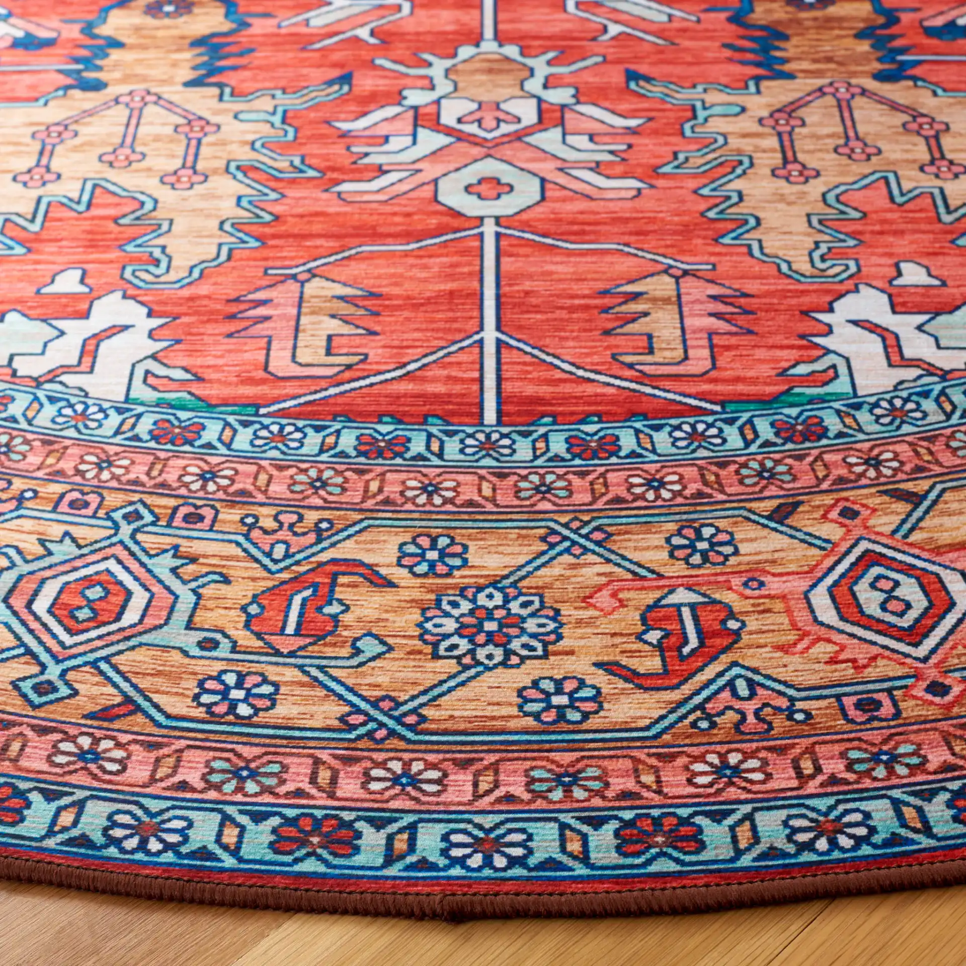Tucson Traditional Allover Washable Rug in Rust / Navy in a styled room
