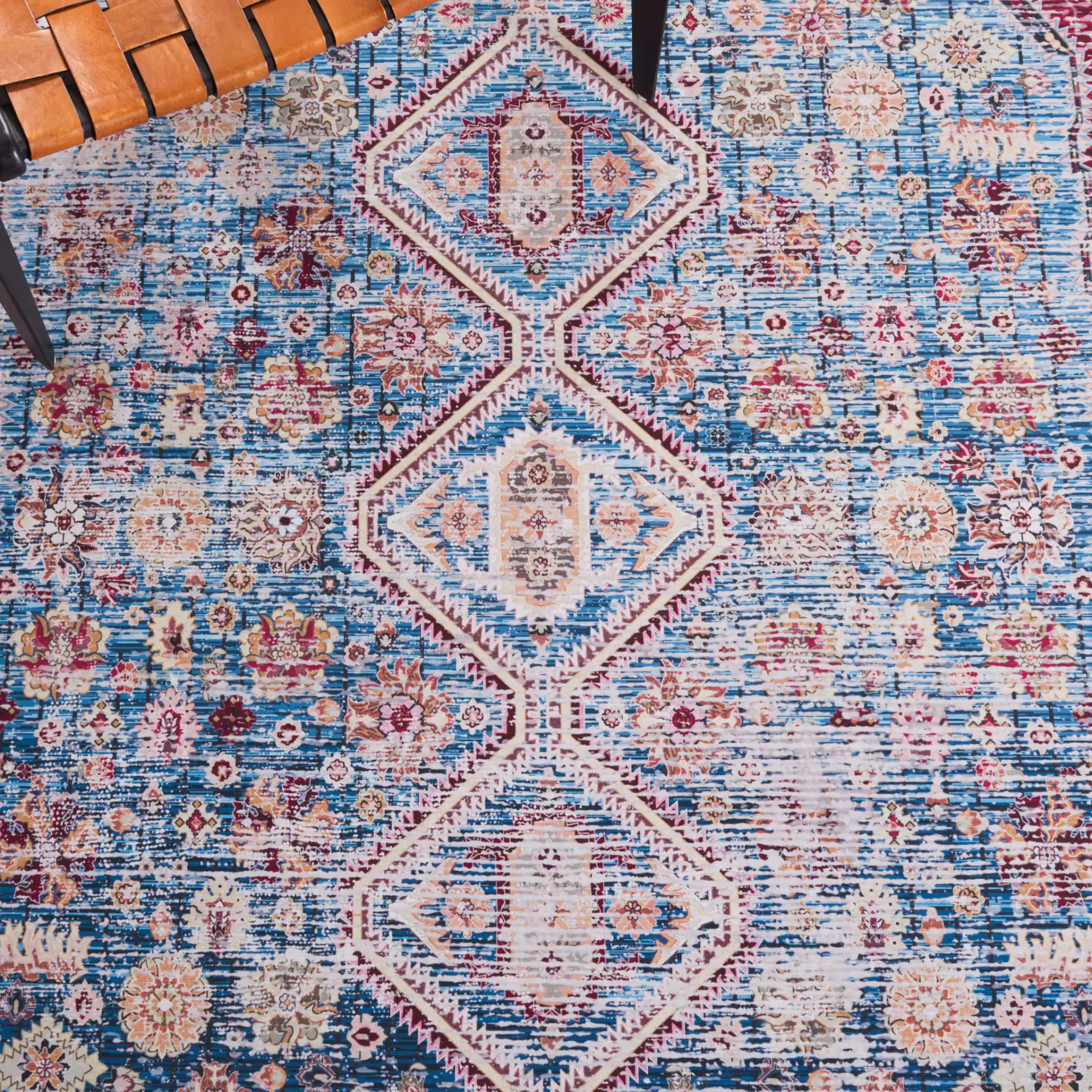 Tucson Triple Medallion Washable Rug in Blue / Red in a styled room
