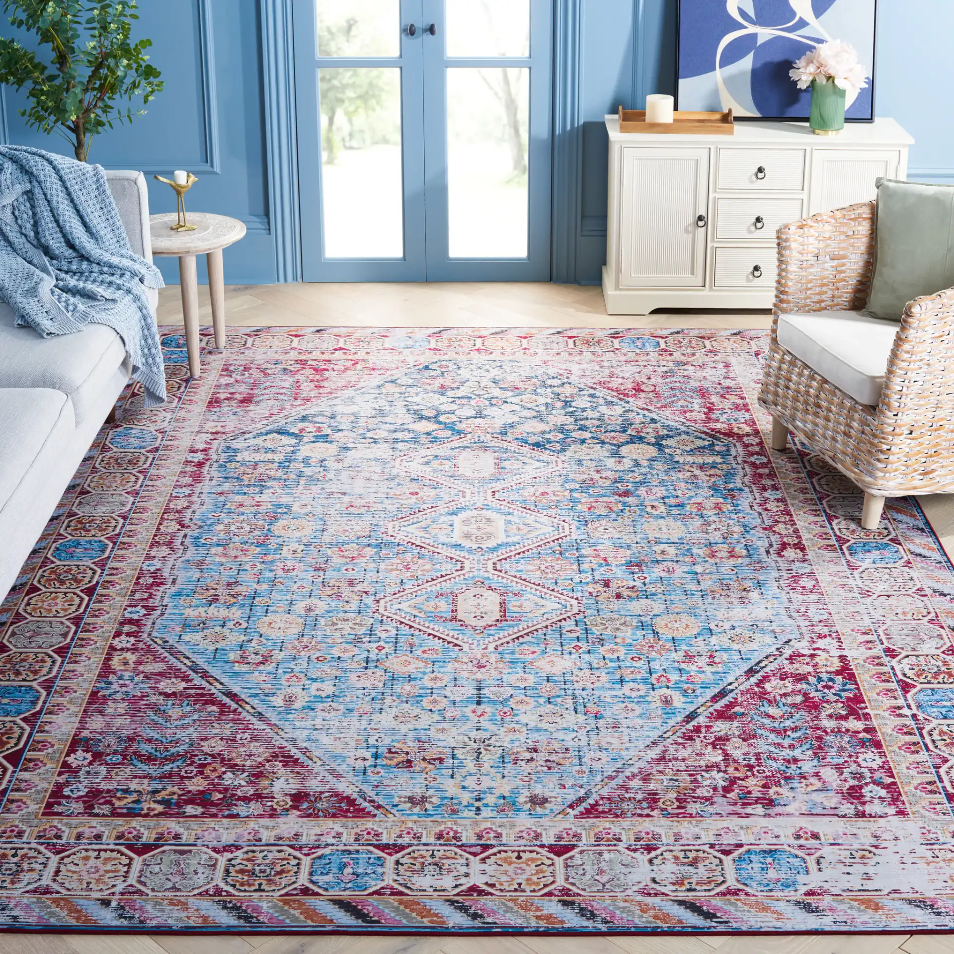 Tucson Triple Medallion Washable Rug in Blue / Red in a styled room