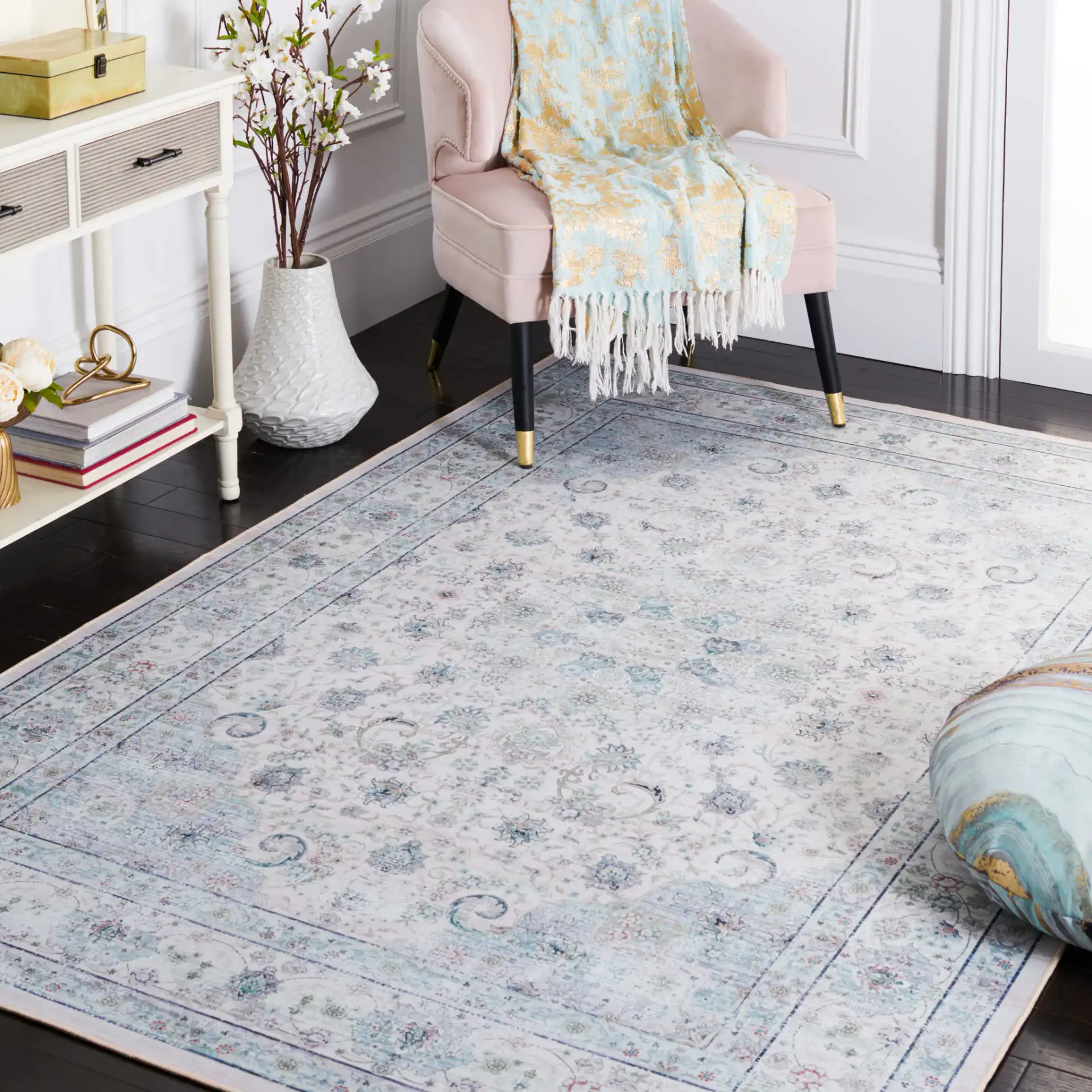 Tucson Distressed Floral Medallion Washable Rug in Beige / Green in a styled room
