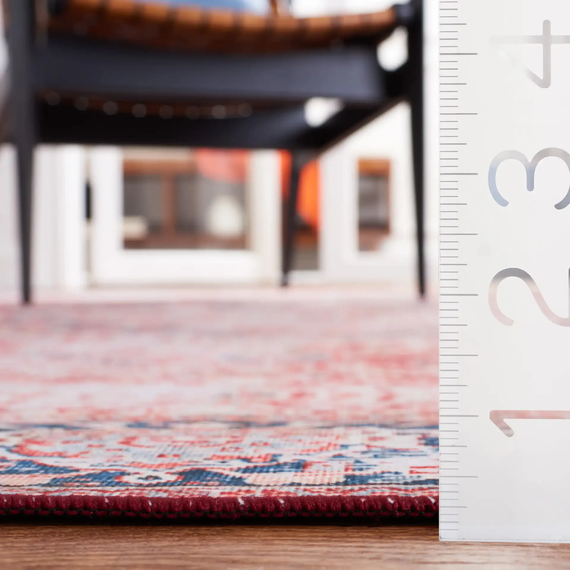 Tucson Distressed Hexagon Medallion Washable Rug in Rust / Navy in a styled room