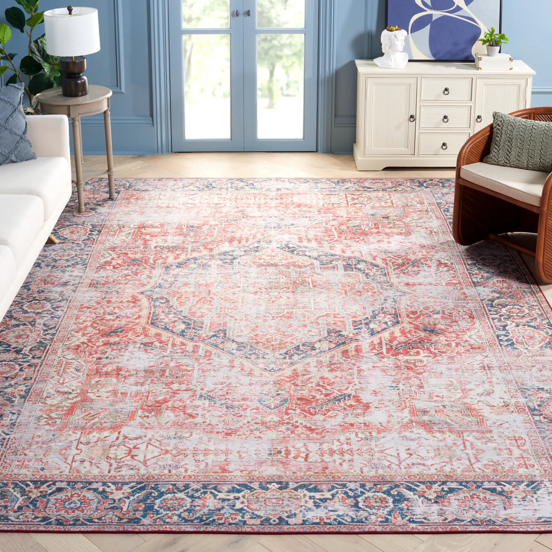 Tucson Distressed Hexagon Medallion Washable Rug in Rust / Navy in a styled room
