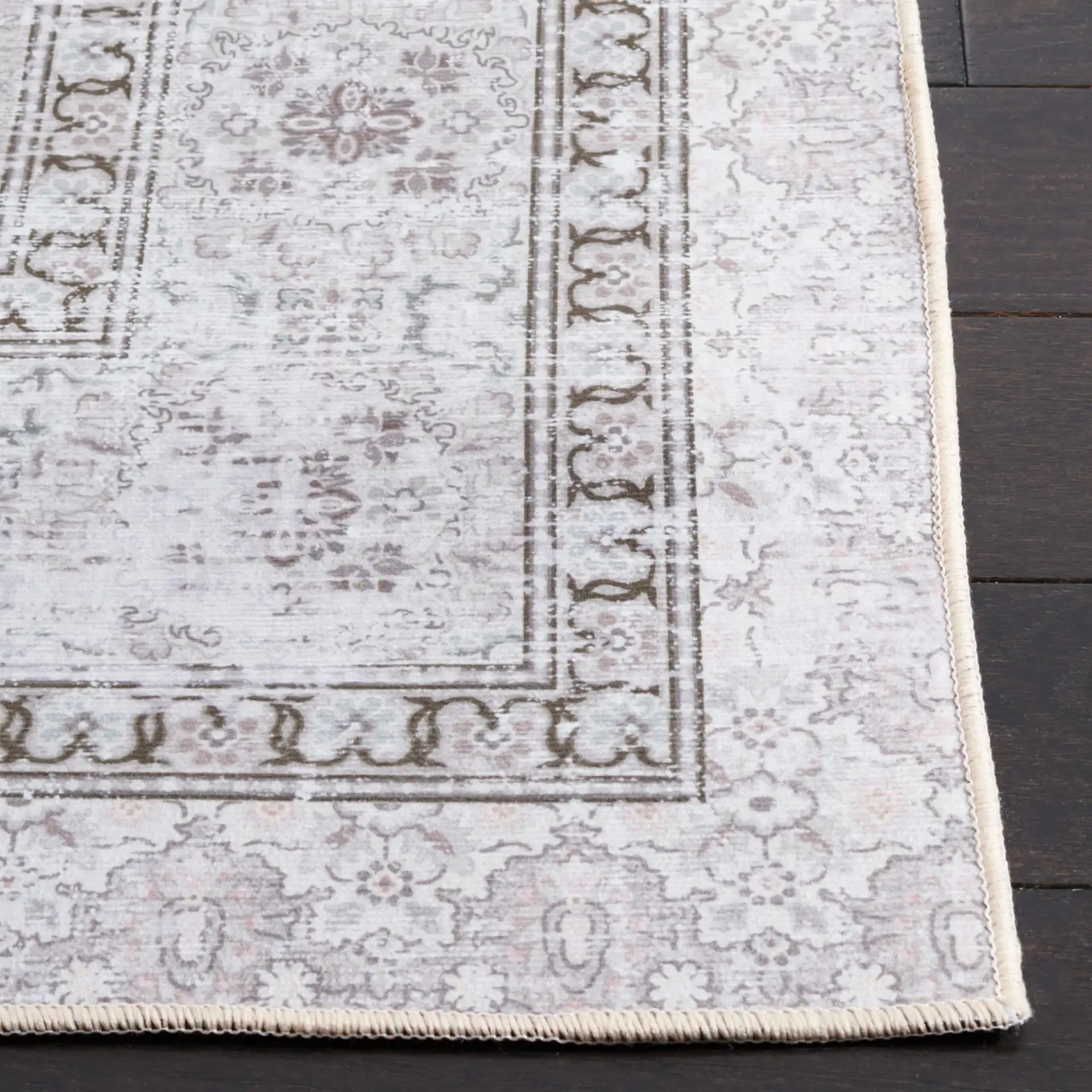 Tucson Open Field Rosette Medallion Washable Rug in Beige / Light Green in a styled room