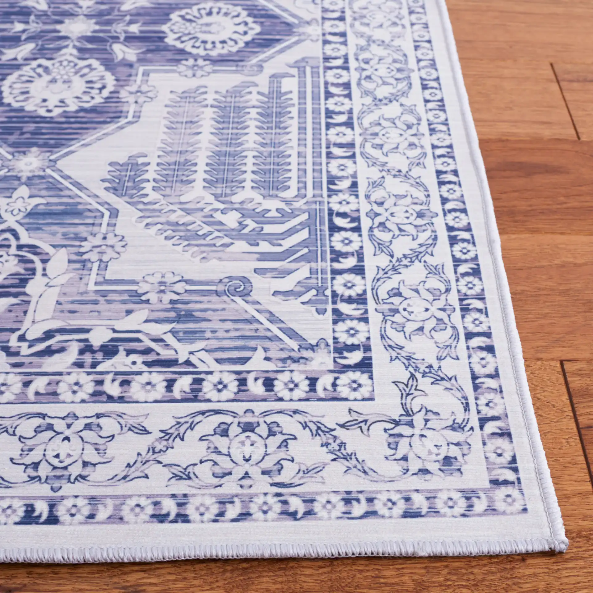 Tucson Patchwork Tile Washable Rug in Gray / Navy in a styled room