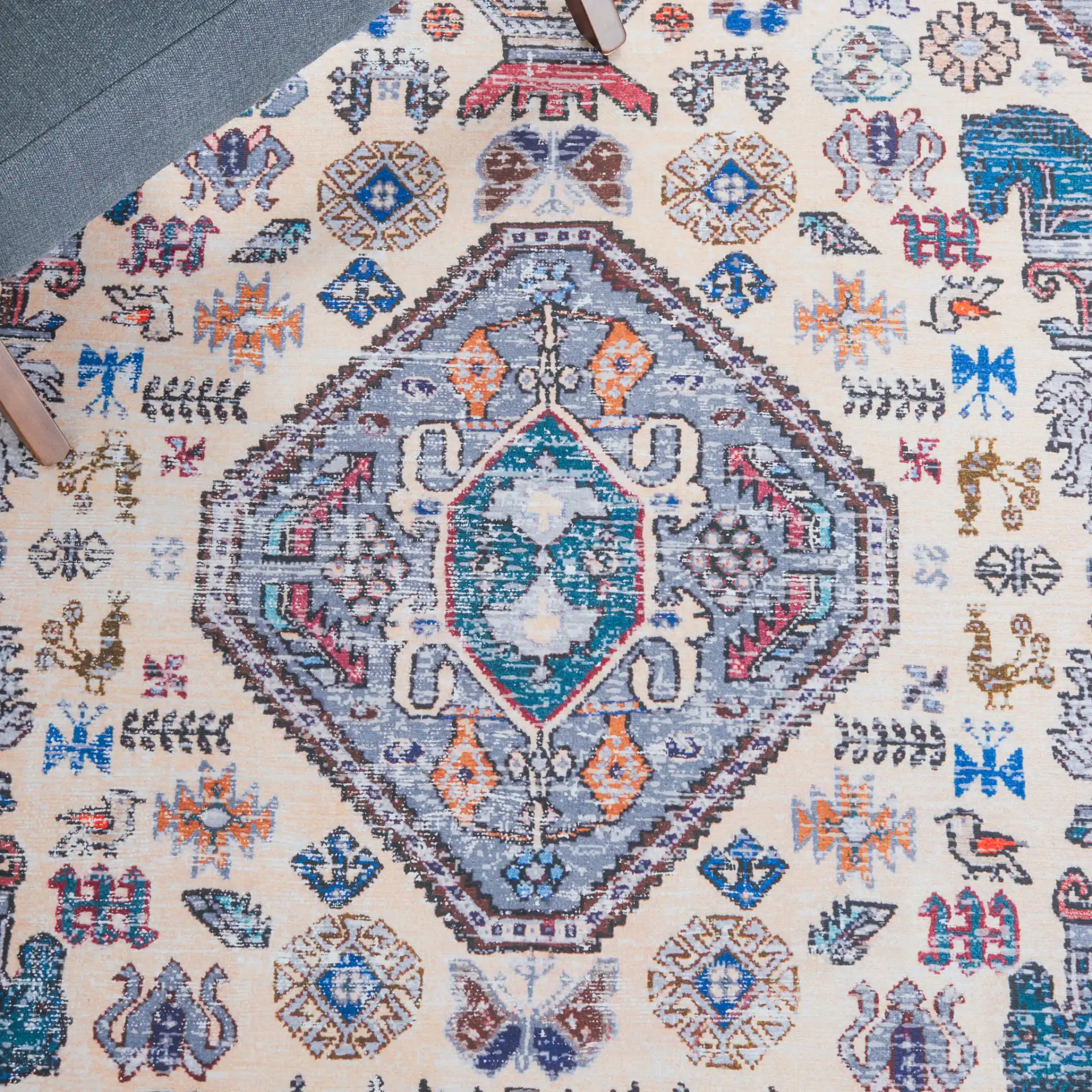 Tucson Tribal Medallion Washable Rug in Beige / Gray in a styled room