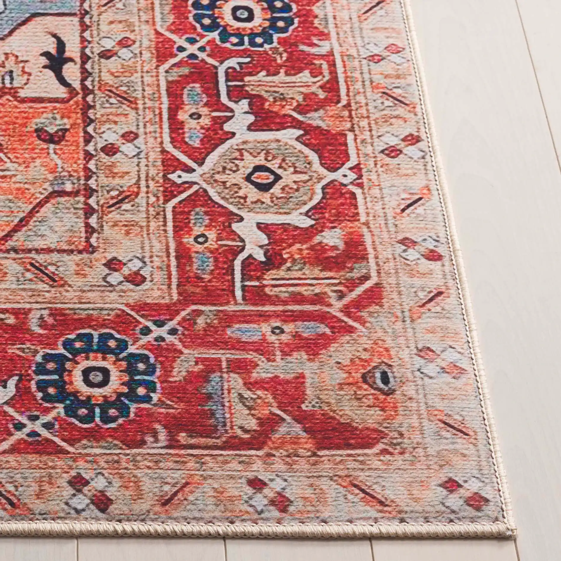 Tucson Square Medallion Washable Rug in Beige / Rust in a styled room