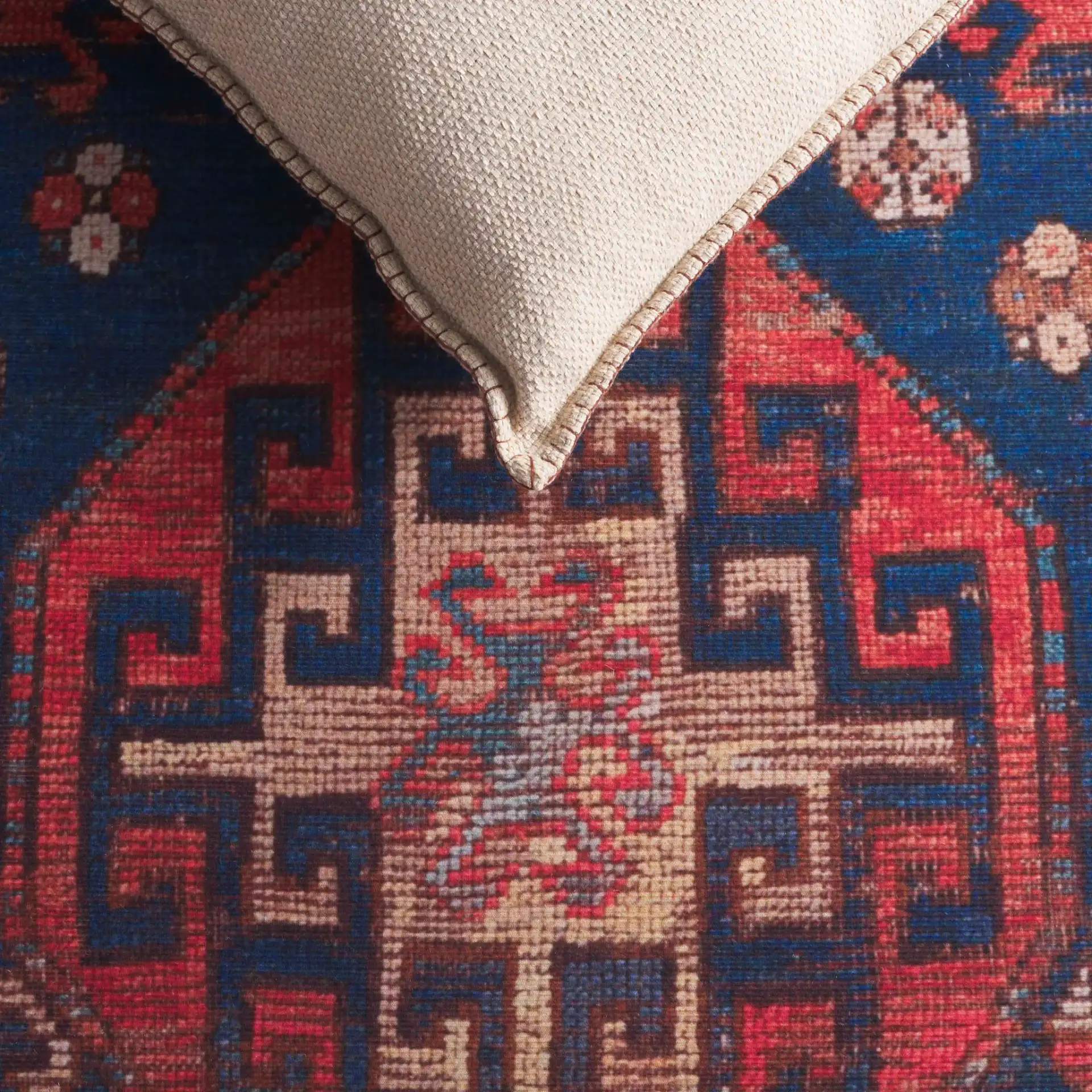 Tucson Southwestern Octagon Medallion Washable Rug in Navy / Rust in a styled room