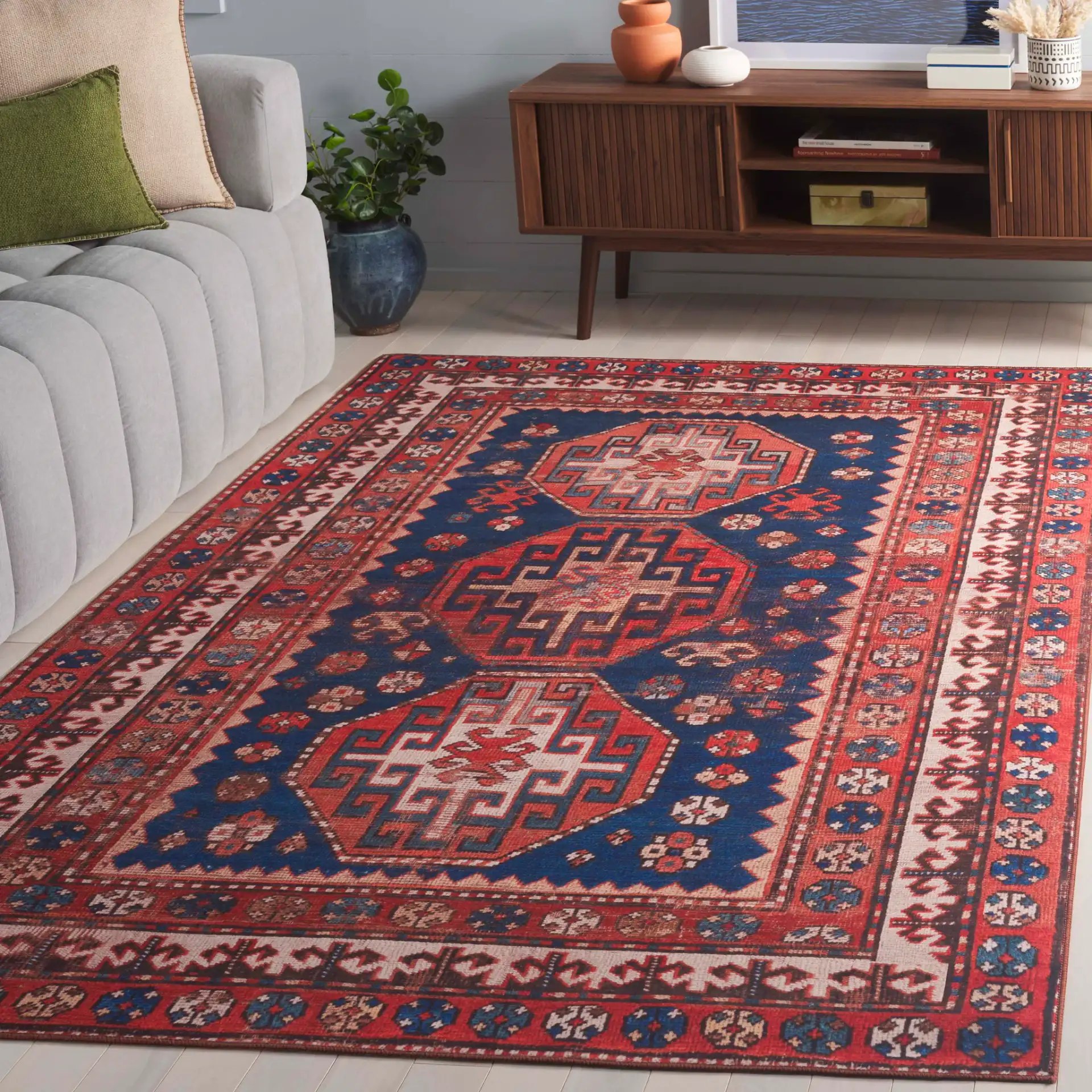 Tucson Southwestern Octagon Medallion Washable Rug in Navy / Rust in a styled room
