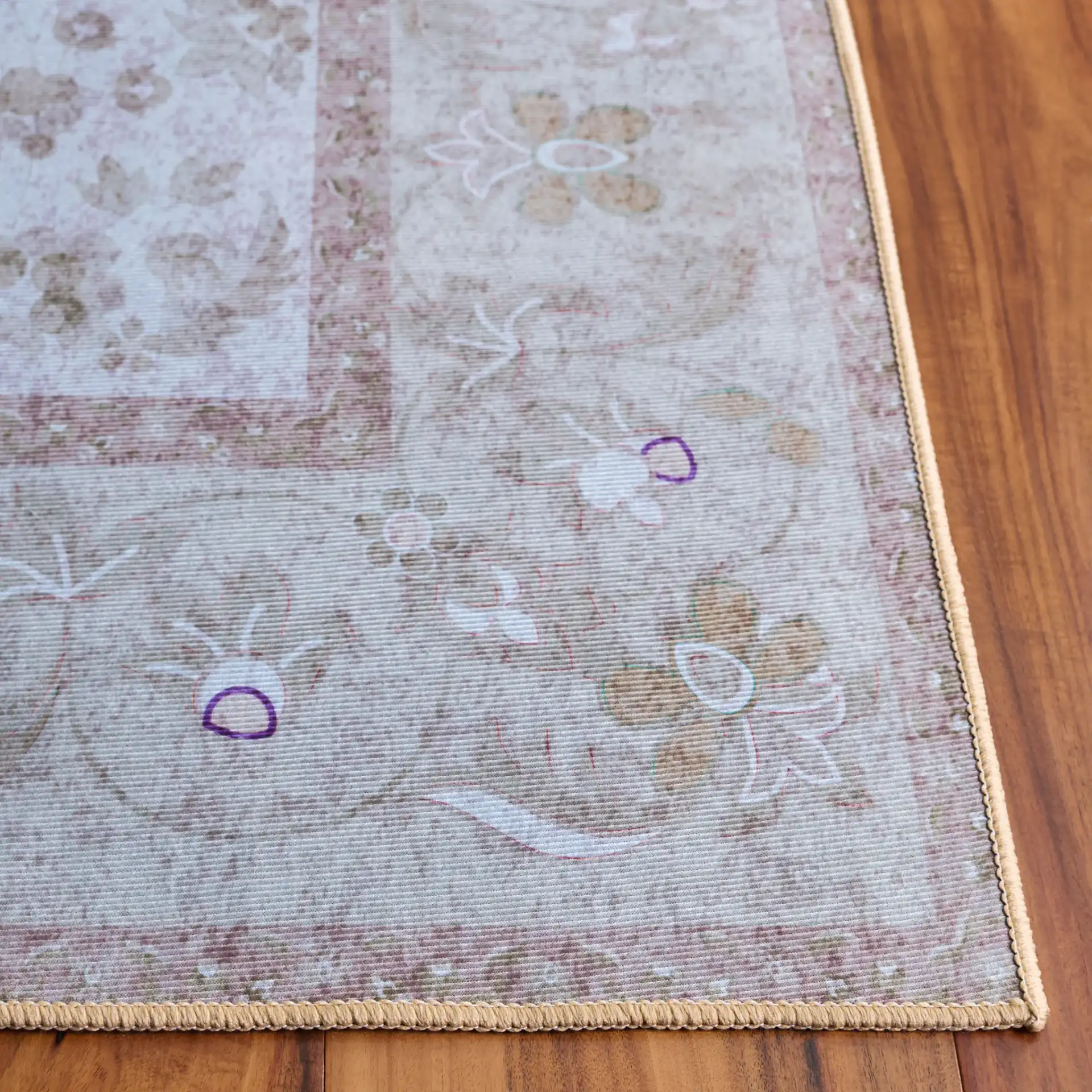 Tucson Vine Floral Bordered Washable Rug in Beige / Light Brown in a styled room