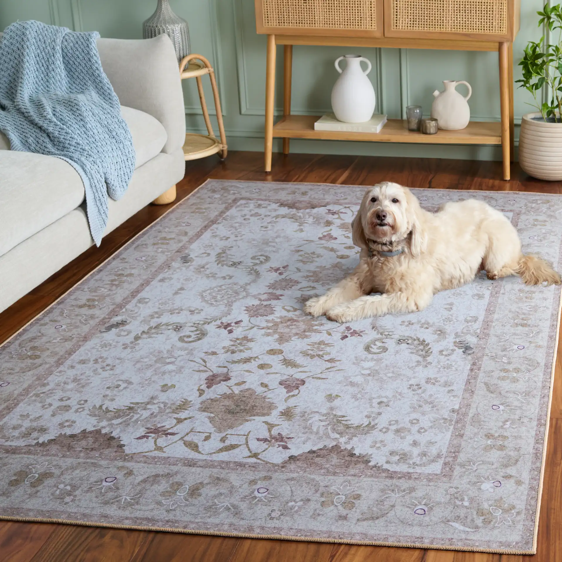 Tucson Vine Floral Bordered Washable Rug in Beige / Light Brown in a styled room