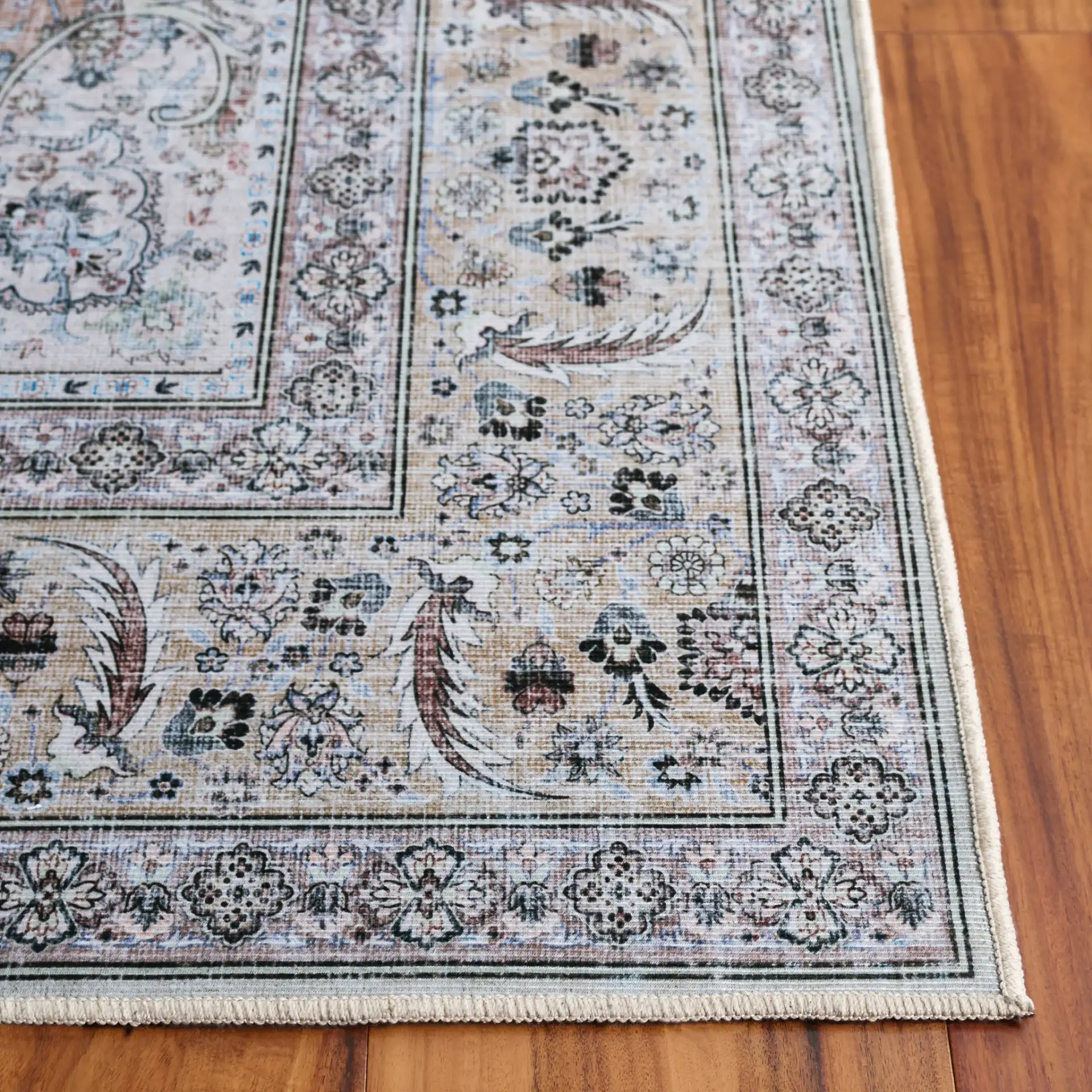 Tucson Vintage Round Floral Medallion Washable Rug in Light Green / Beige in a styled room