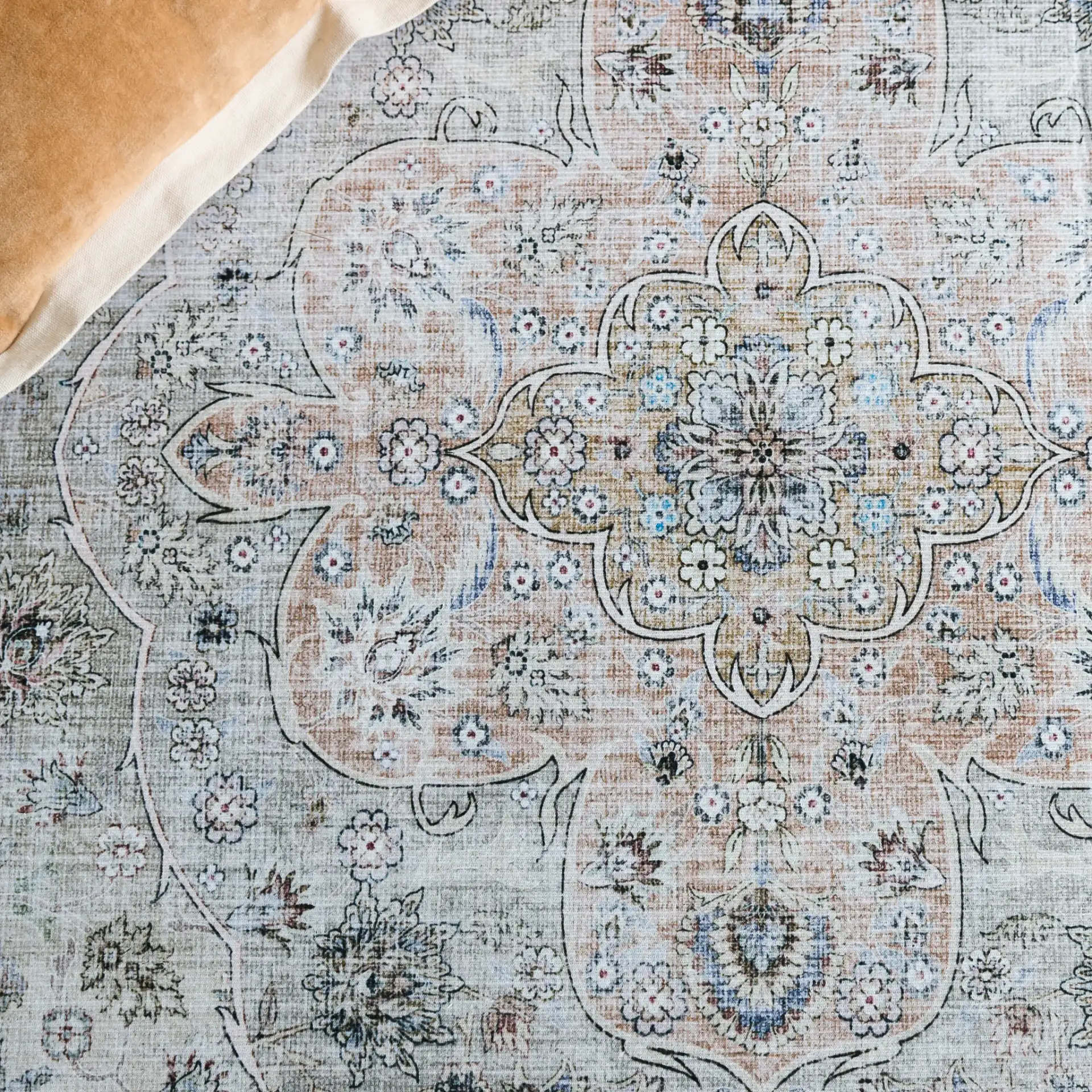 Tucson Vintage Round Floral Medallion Washable Rug in Light Green / Beige in a styled room