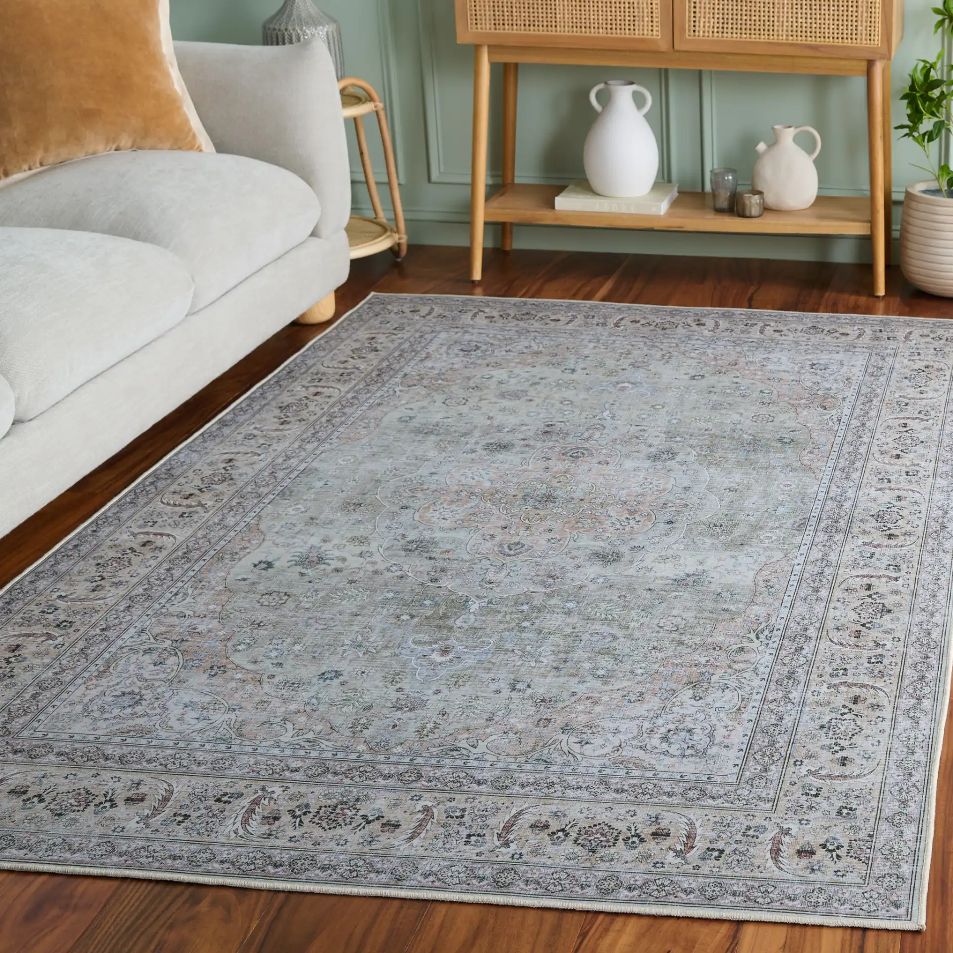 Tucson Vintage Round Floral Medallion Washable Rug in Light Green / Beige in a styled room