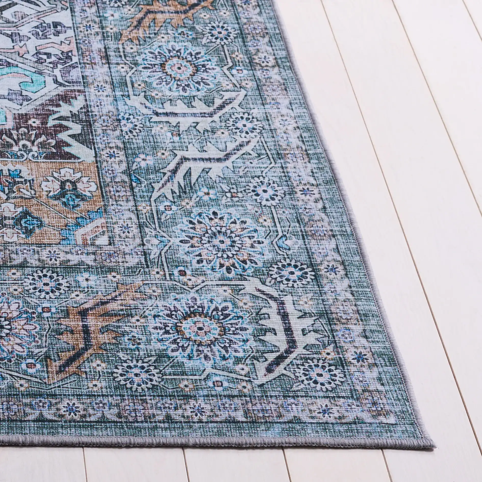 Tucson Transitional Medallion Washable Rug in Copper / Green in a styled room