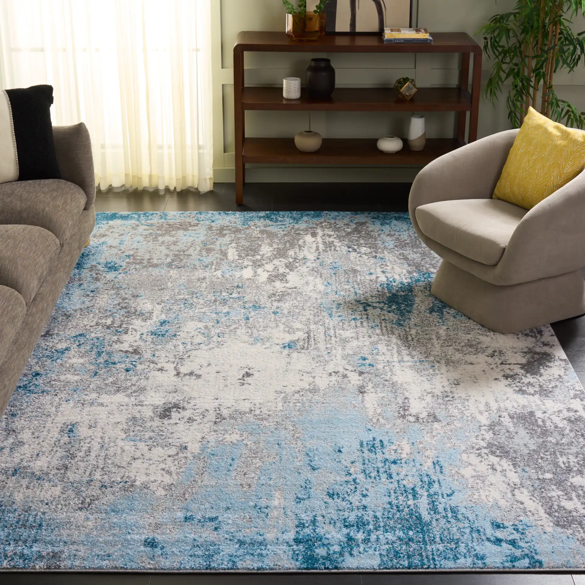 Tulum Abstract Rug in Gray / Blue in a styled room