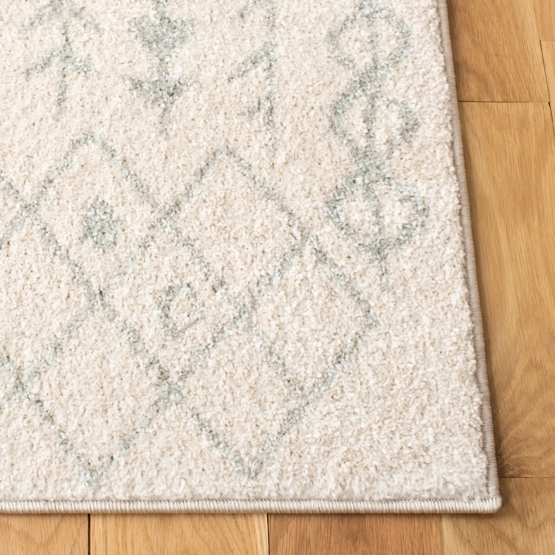 Tulum Tribal Arrow Rug in Ivory / Light Gray in a styled room