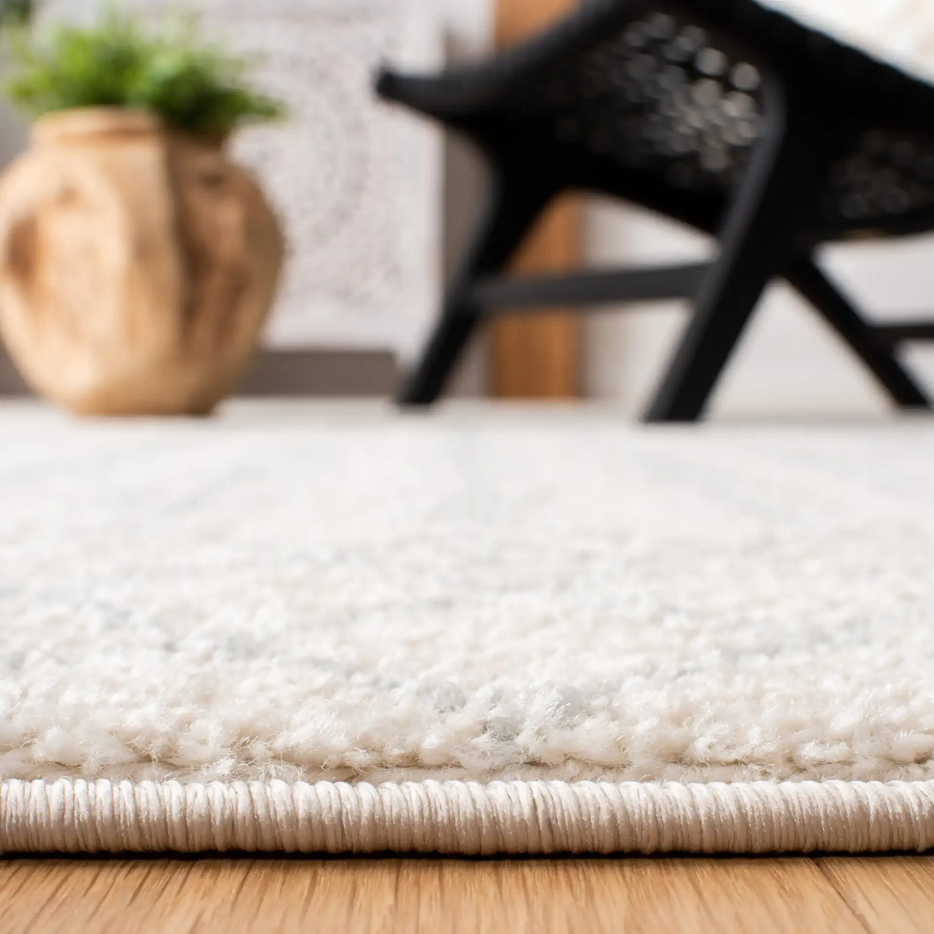 Tulum Tribal Arrow Rug in Ivory / Light Gray in a styled room
