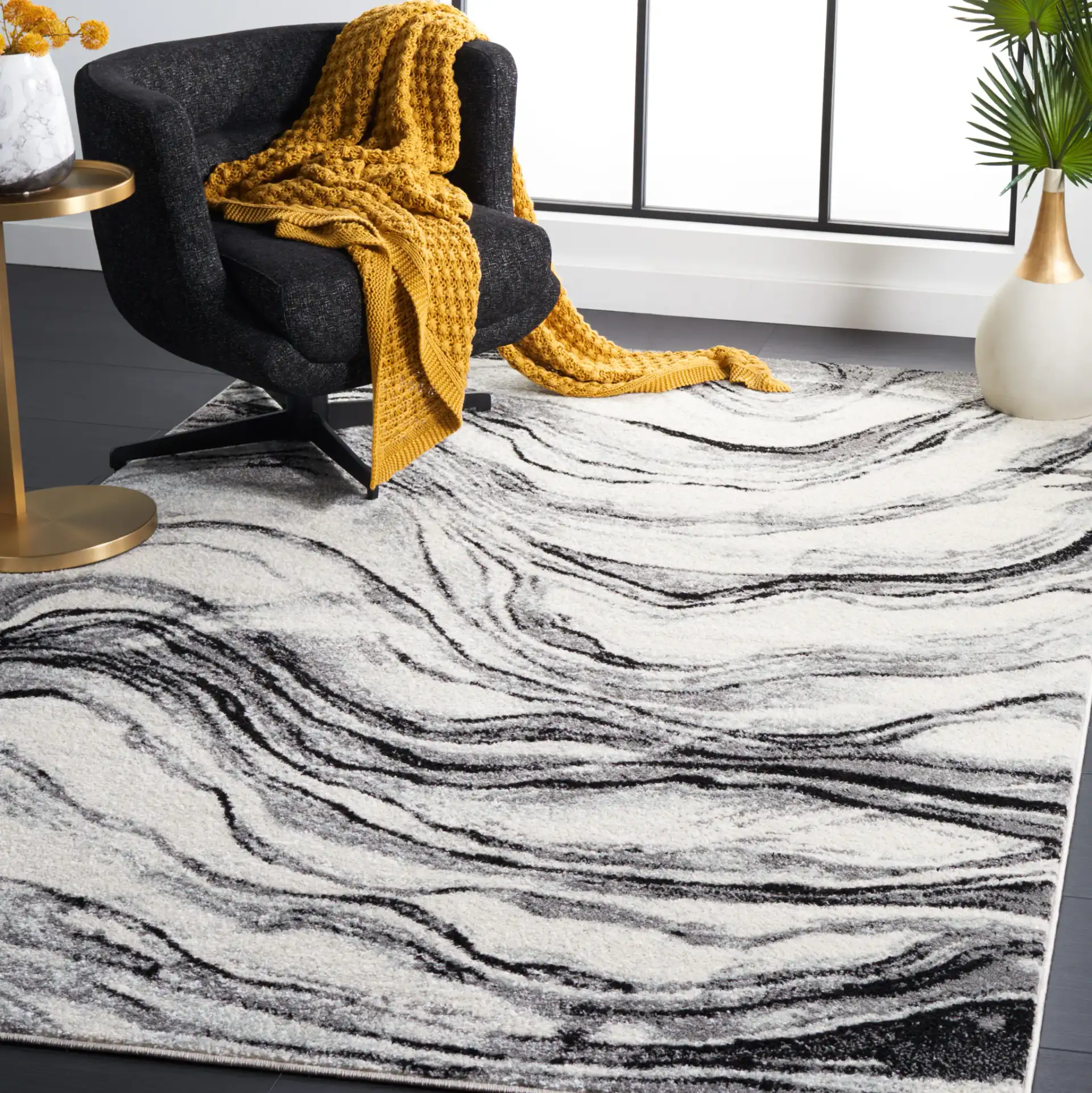 Tulum Marbled Waves Rug in Ivory / Black in a styled room