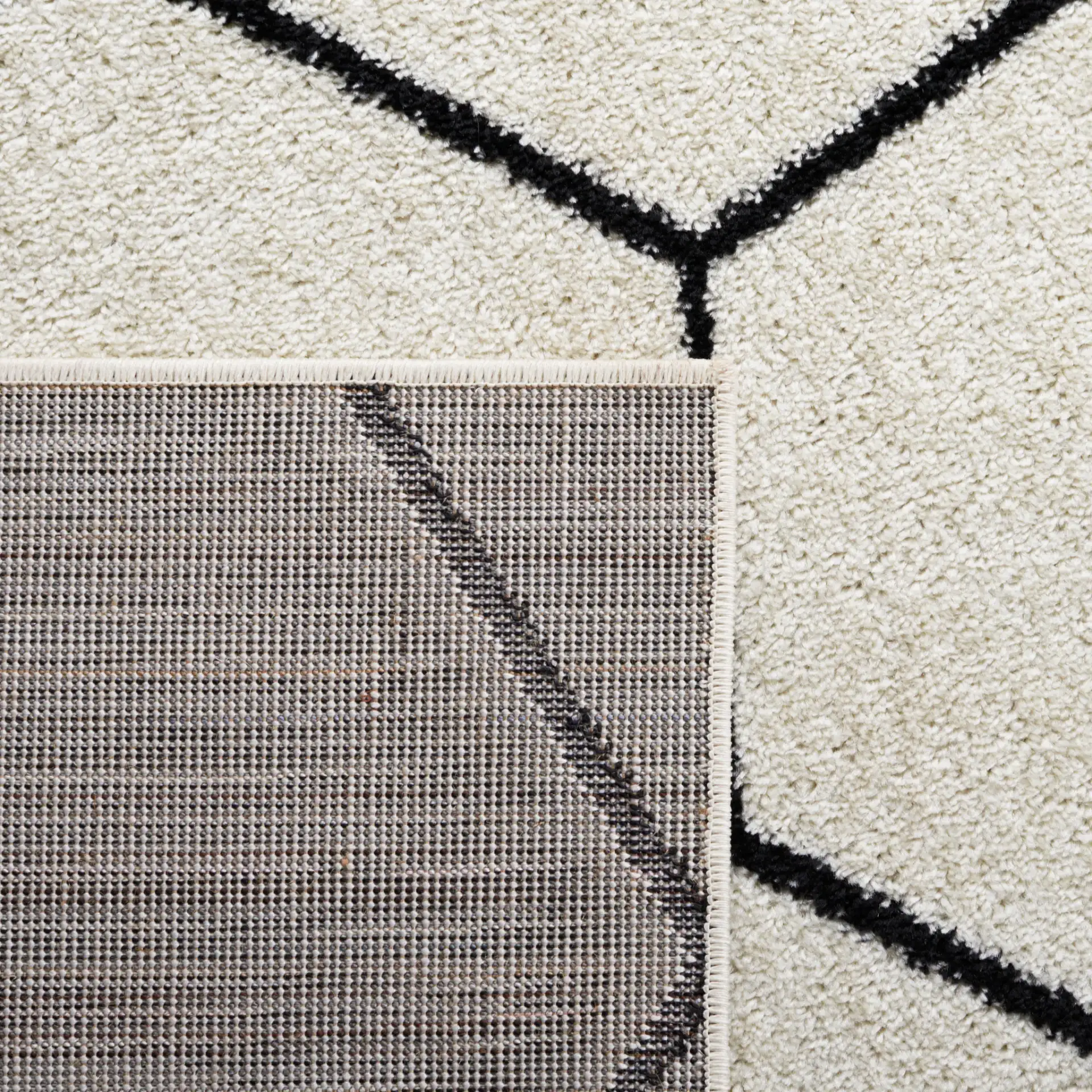 Tulum Geometric Rug in Ivory / Black in a styled room