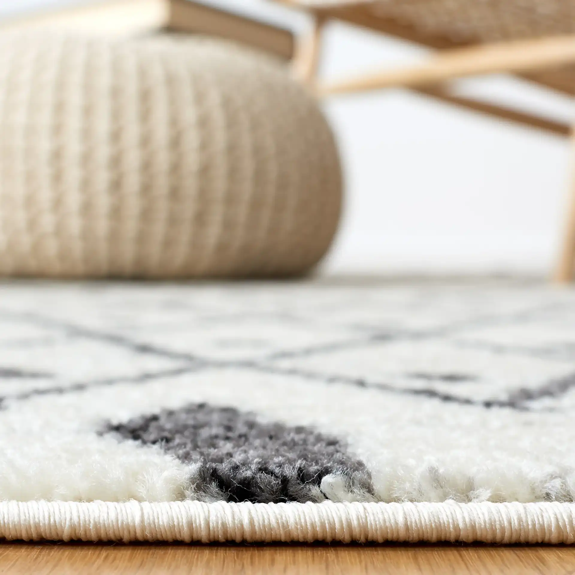 Tulum Leaf Trellis Rug in Ivory / Black in a styled room