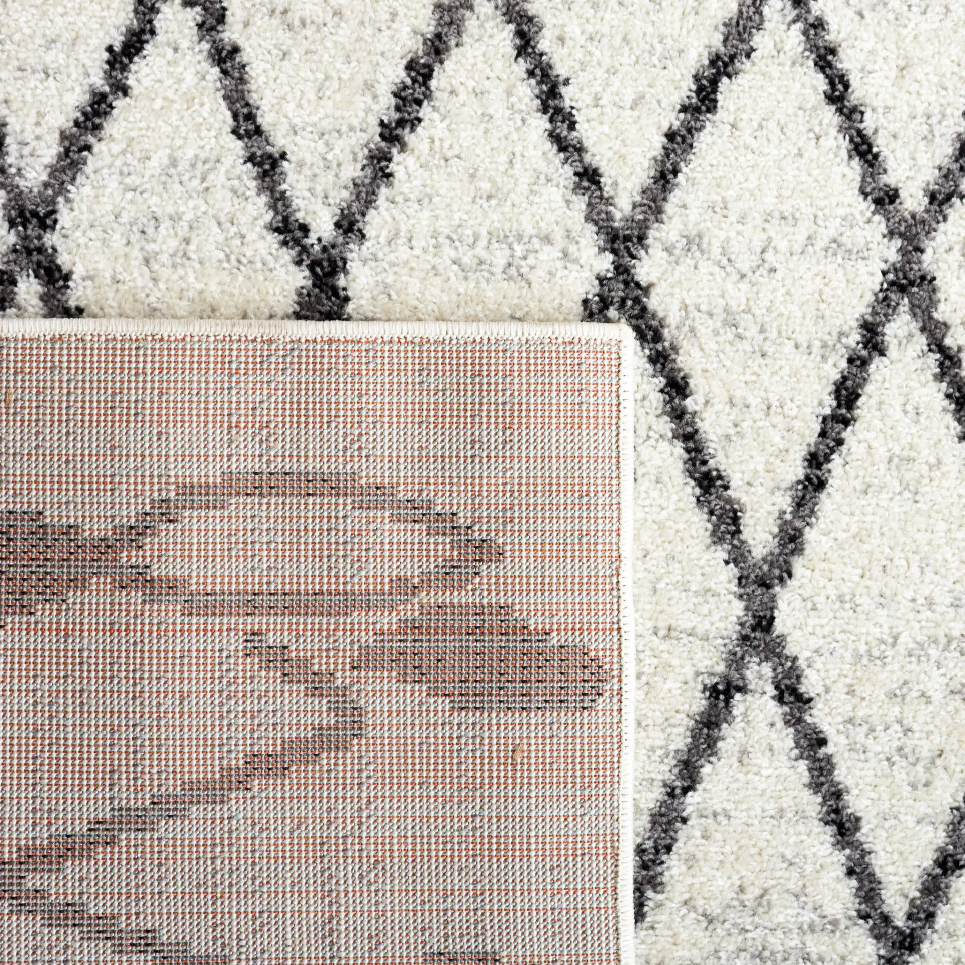 Tulum Leaf Trellis Rug in Ivory / Black in a styled room