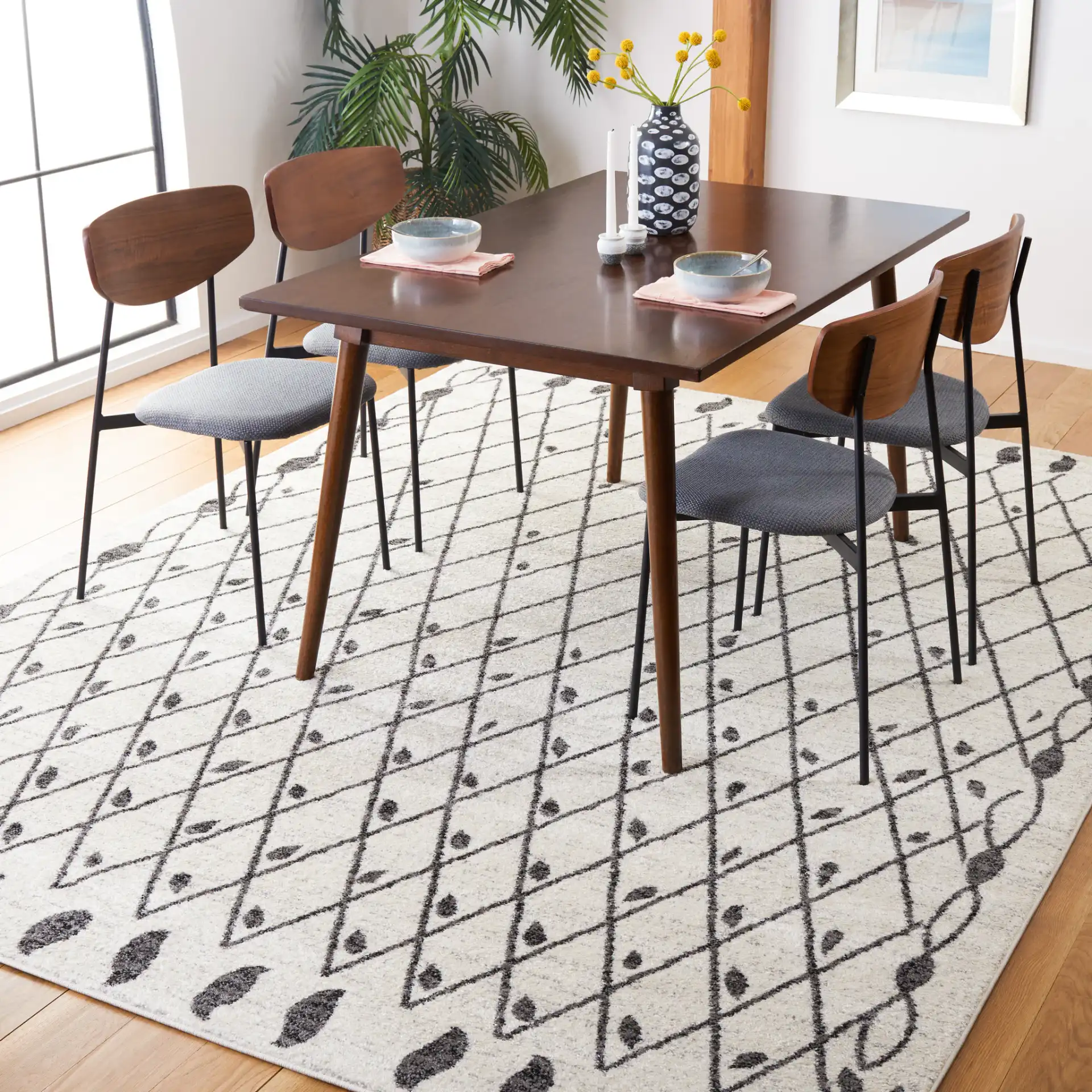 Tulum Leaf Trellis Rug in Ivory / Black in a styled room