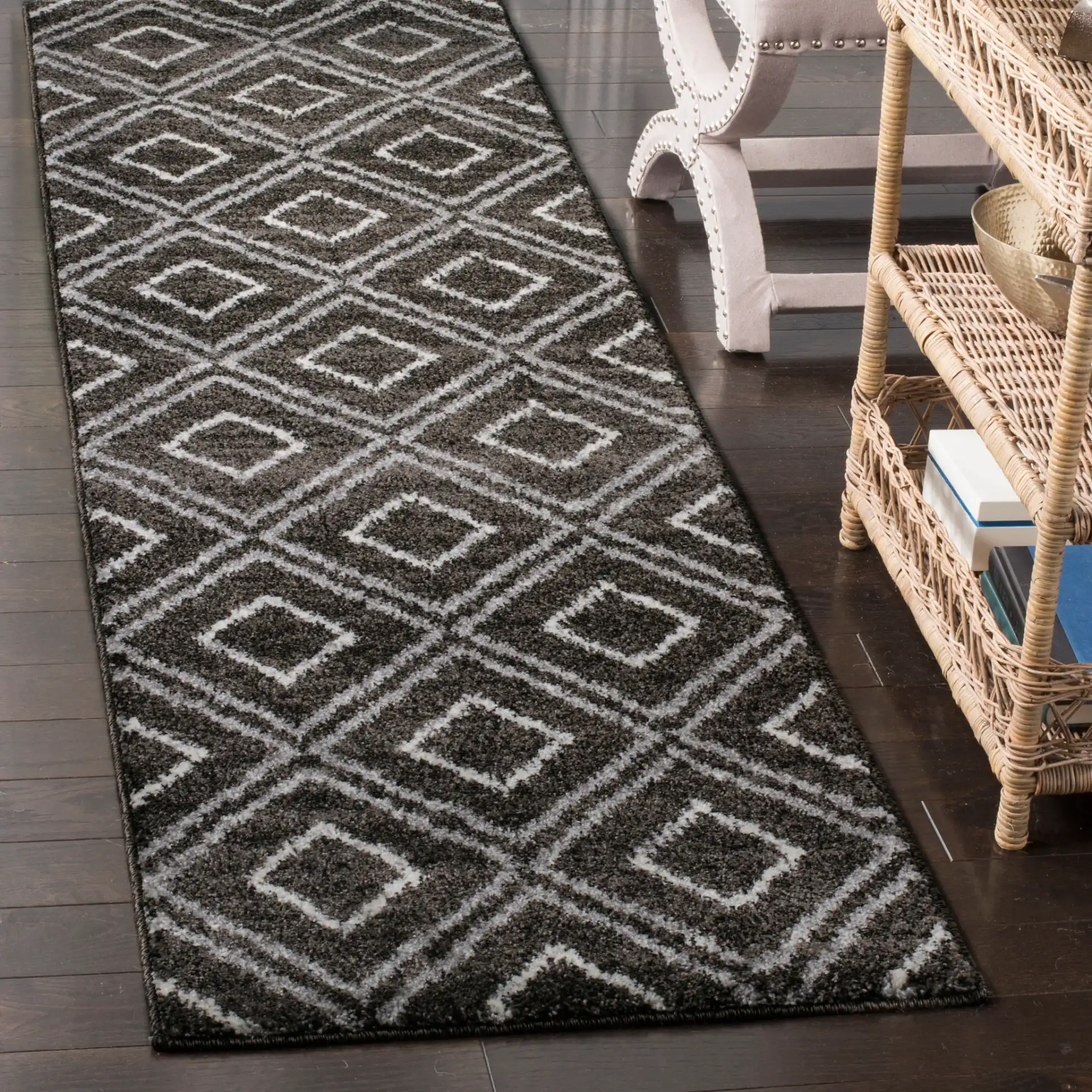 Tunisia Ikat Diamond Rug in Anthracite / Cream in a styled room