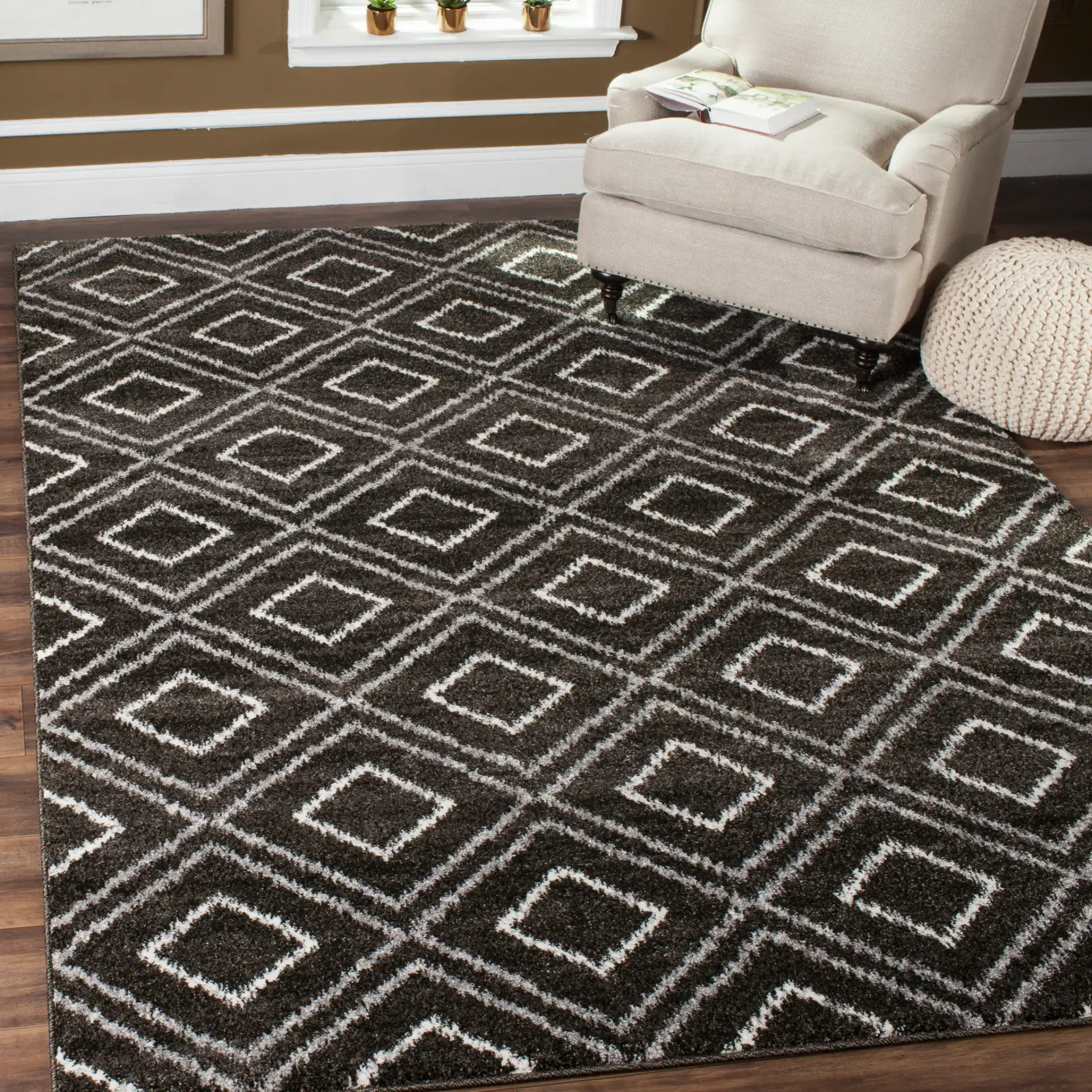 Tunisia Ikat Diamond Rug in Anthracite / Cream in a styled room