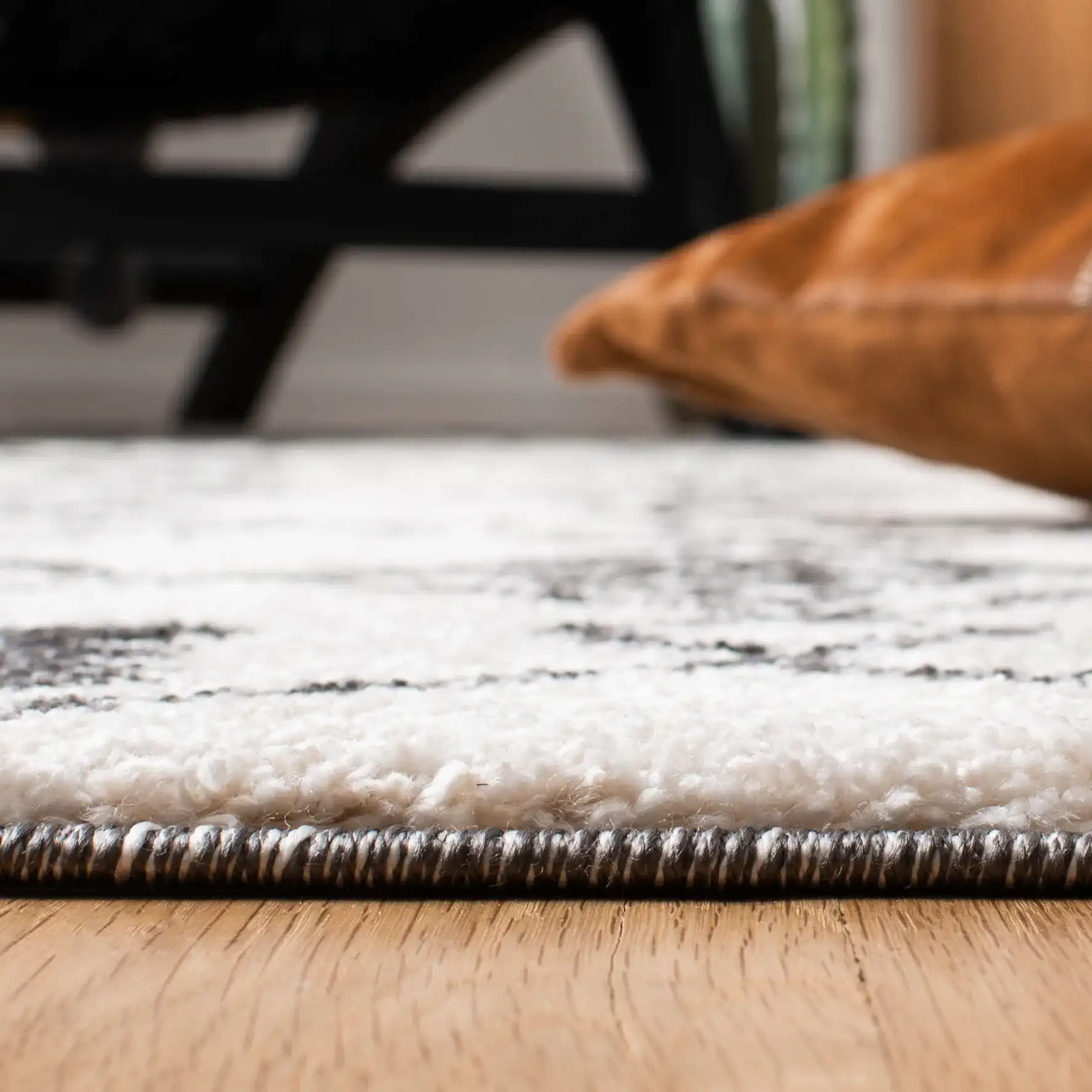 Tunisia Moroccan Diamond Trellis Rug in Ivory / Black in a styled room