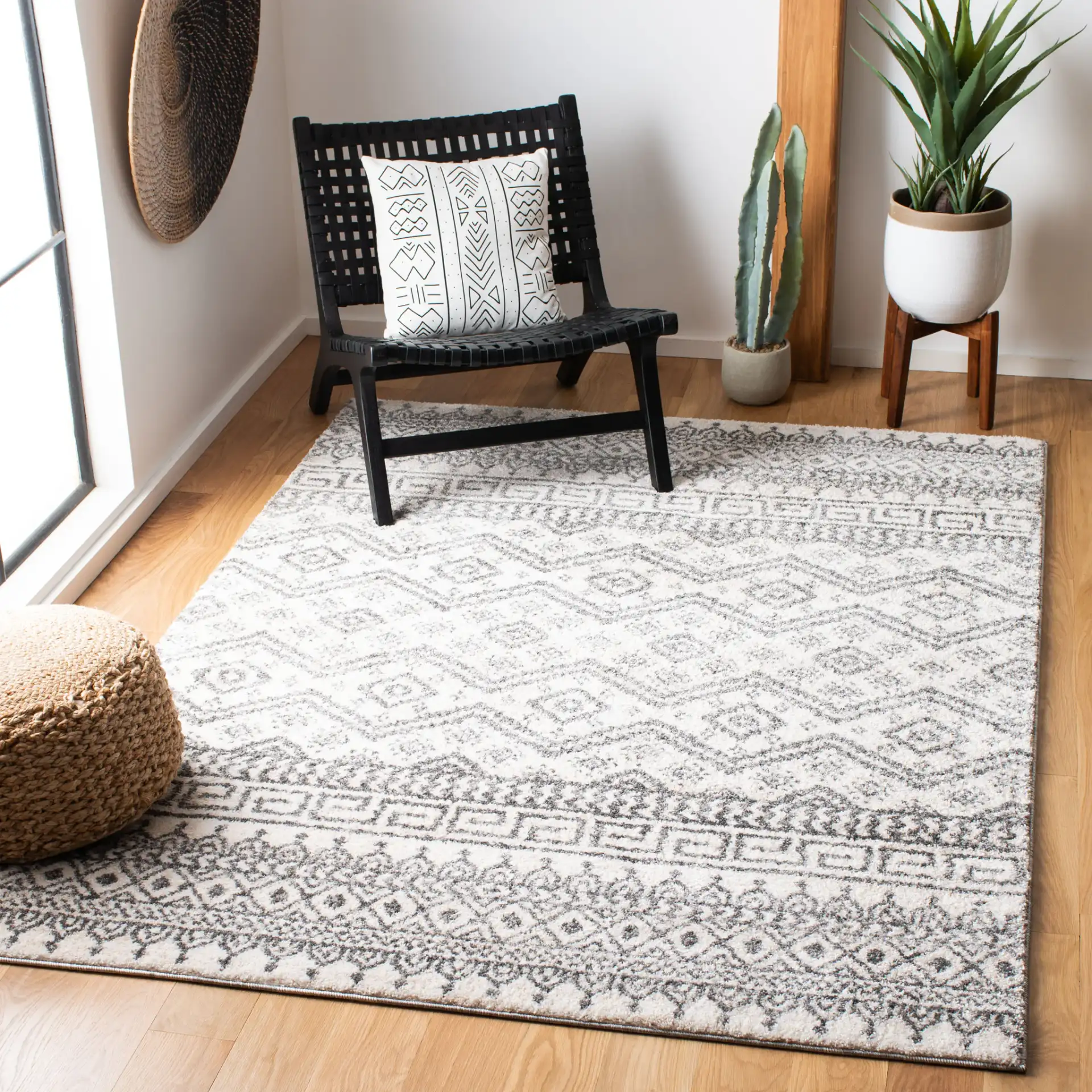 Tunisia Banded Diamond Rug in Ivory / Black in a styled room
