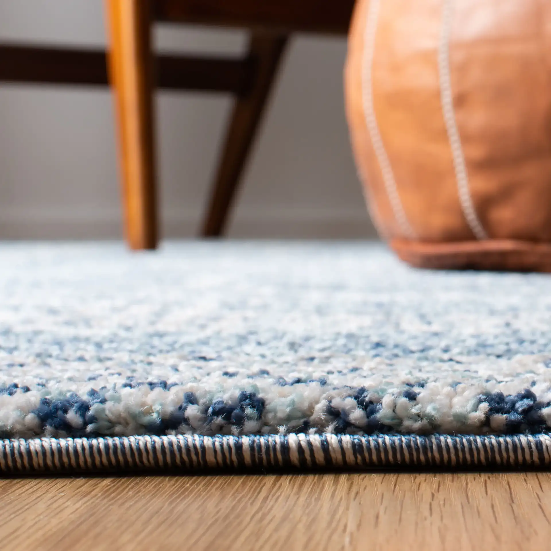 Tunisia Tribal Diamond Rug in Navy / Ivory in a styled room
