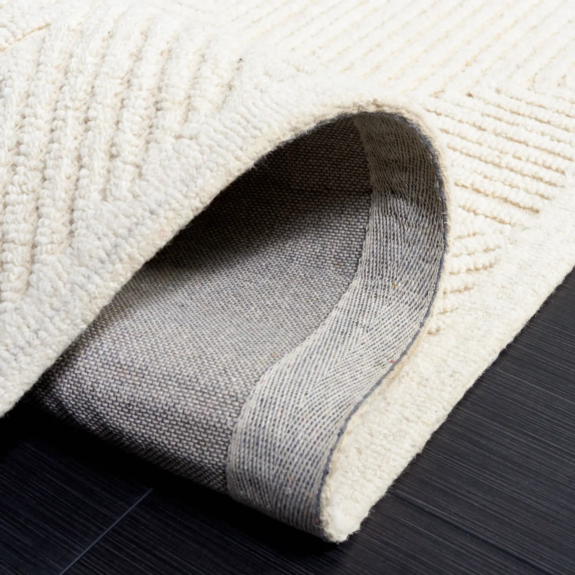 Textural Triangle Grid Hand-Tufted Wool Rug in Ivory in a styled room
