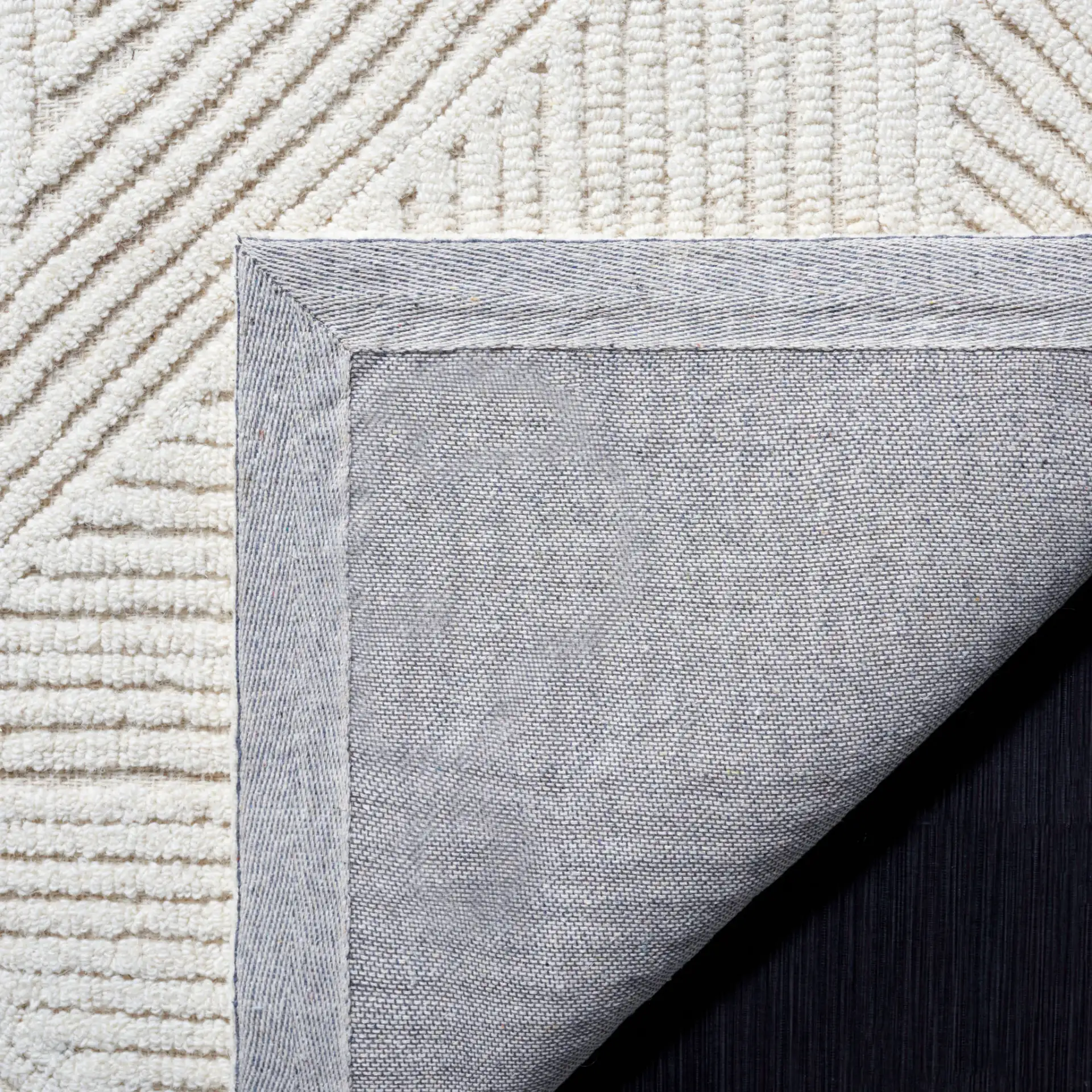 Textural Triangle Grid Hand-Tufted Wool Rug in Ivory in a styled room