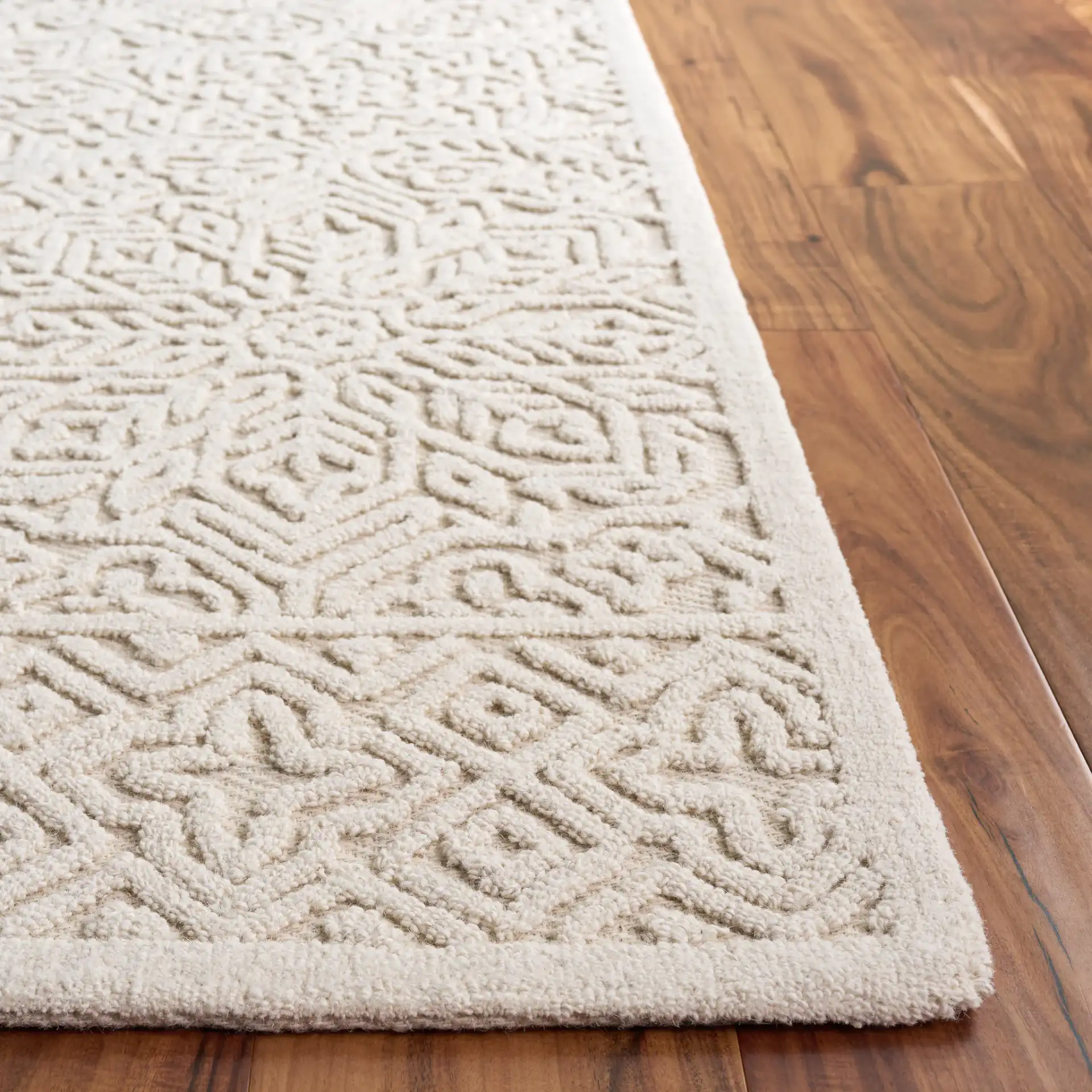 Textural Bohemian Medallion Hand-Tufted Wool Rug in Ivory in a styled room