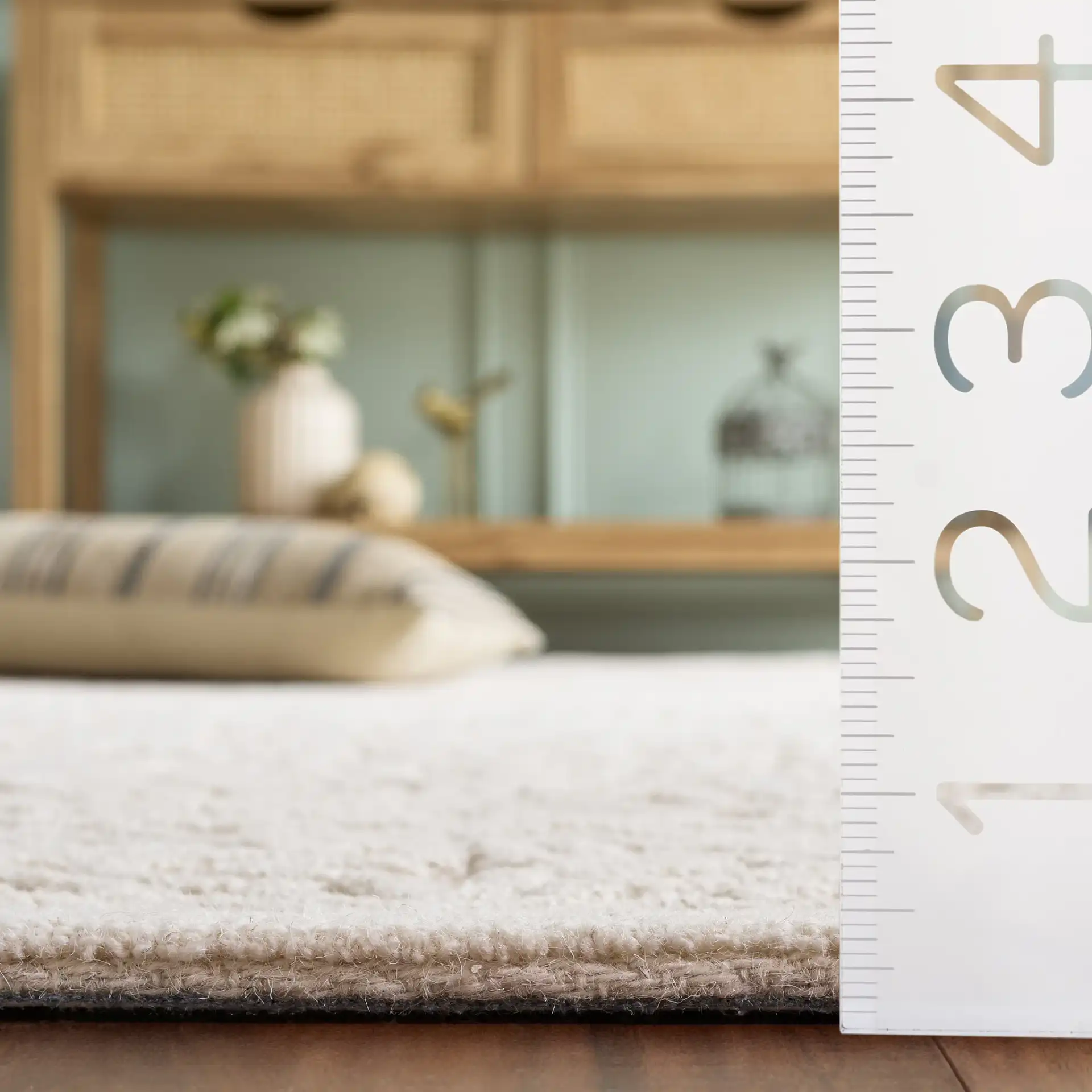 Textural Bohemian Medallion Hand-Tufted Wool Rug in Ivory in a styled room