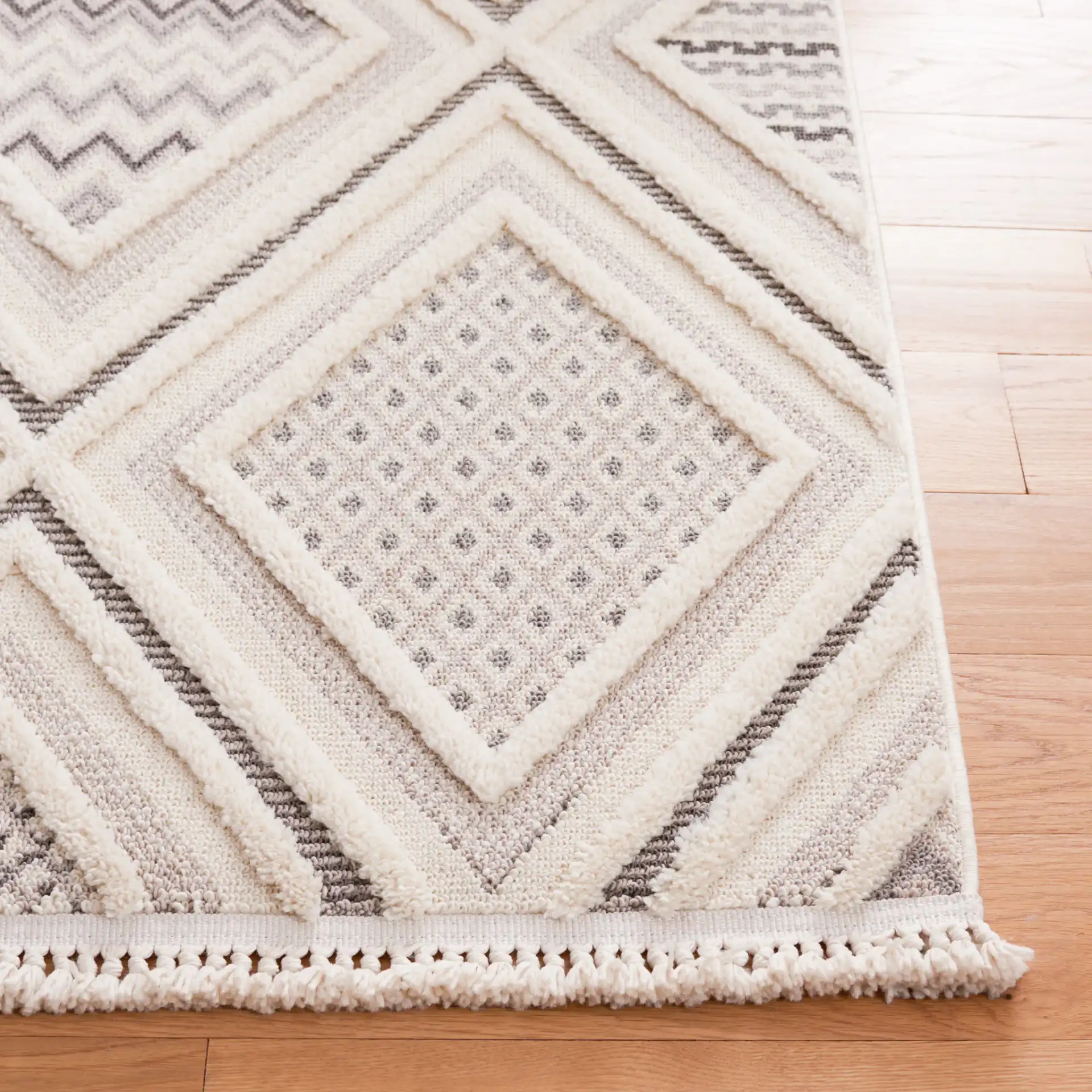 Urban Bohemian Diamond Grid Rug in Gray / Ivory in a styled room