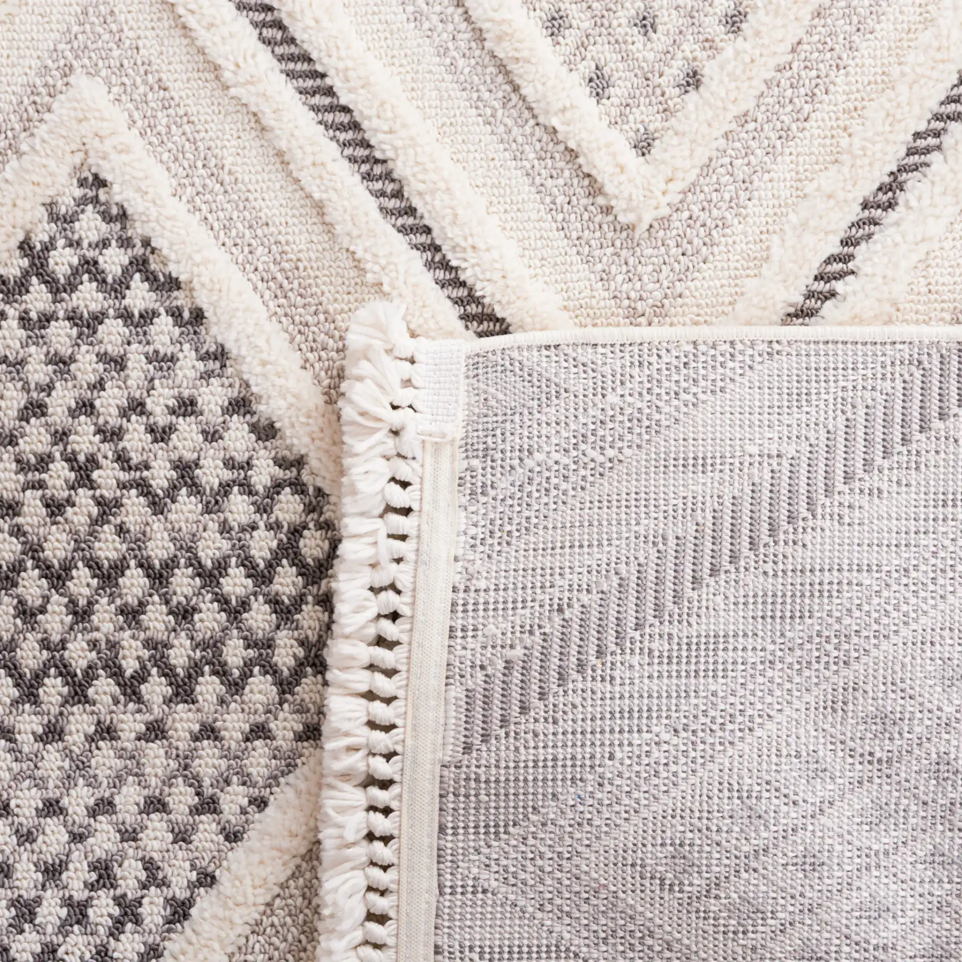 Urban Bohemian Diamond Grid Rug in Gray / Ivory in a styled room