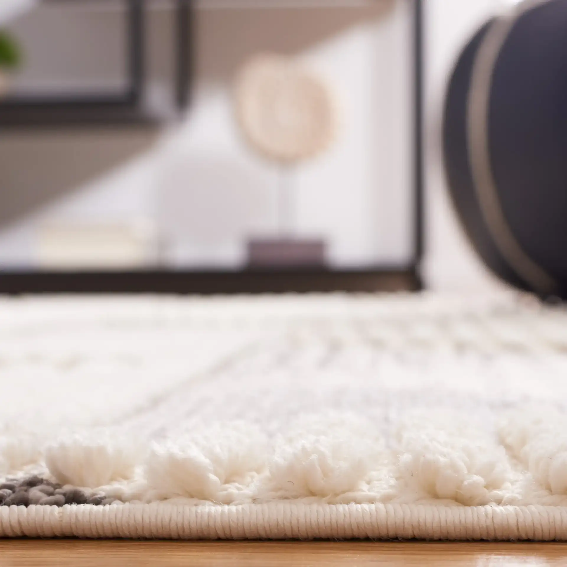 Urban Triangle Rug in Gray / Ivory in a styled room
