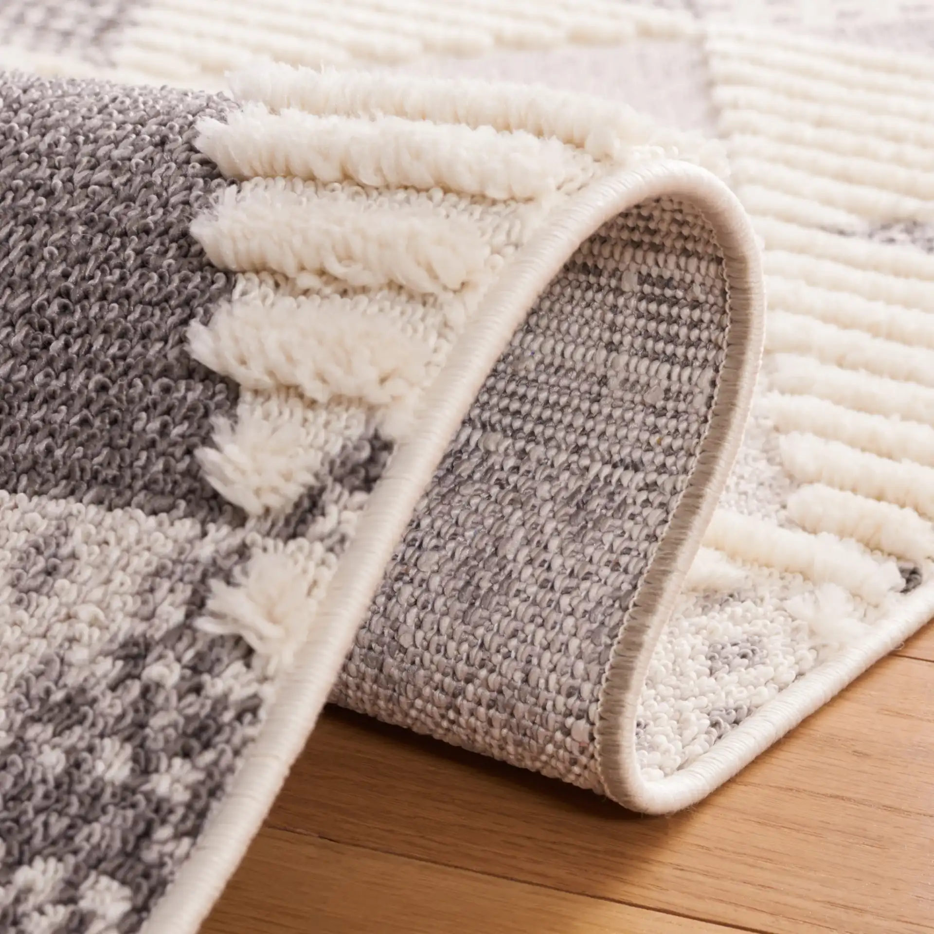 Urban Triangle Rug in Gray / Ivory in a styled room