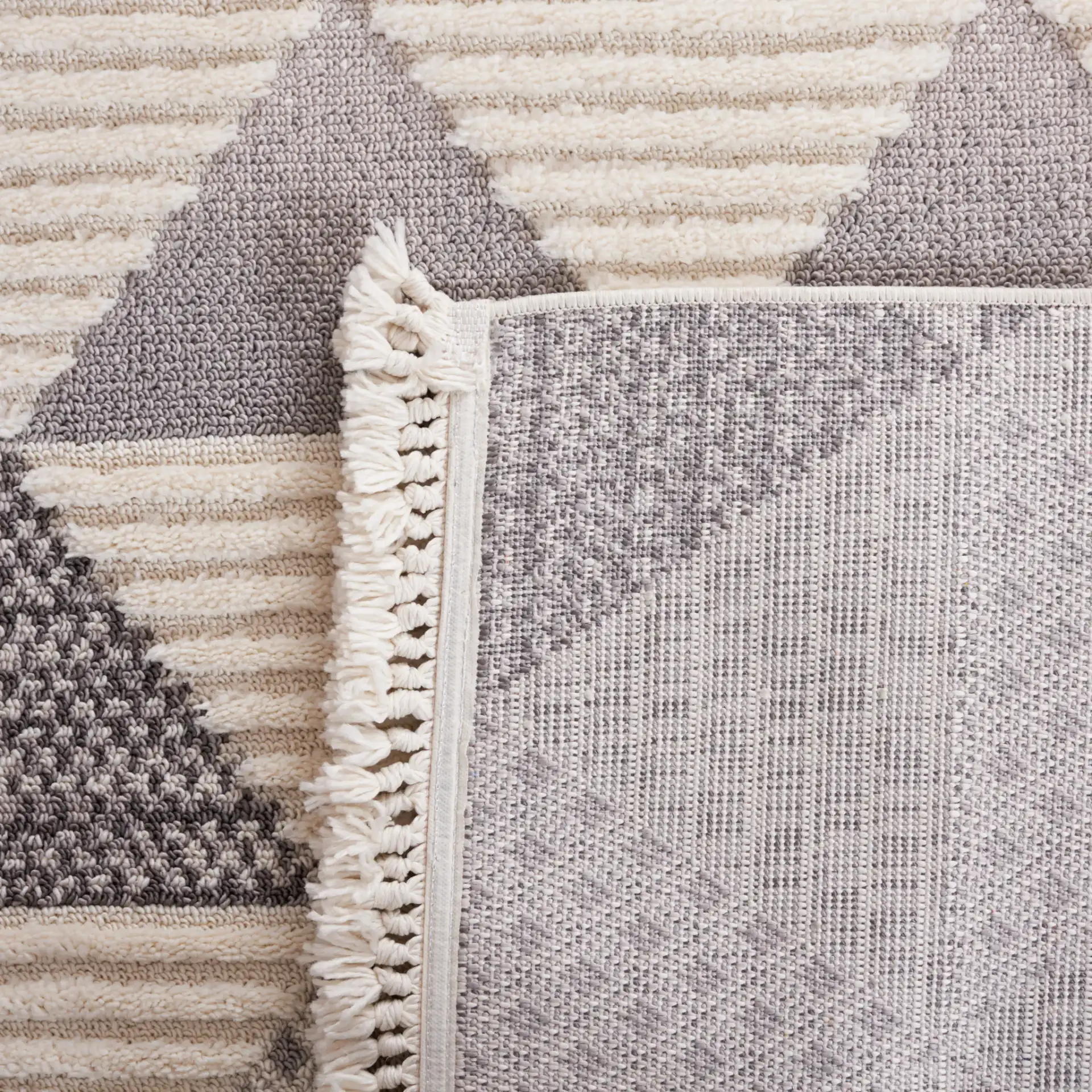 Urban Triangle Rug in Gray / Ivory in a styled room