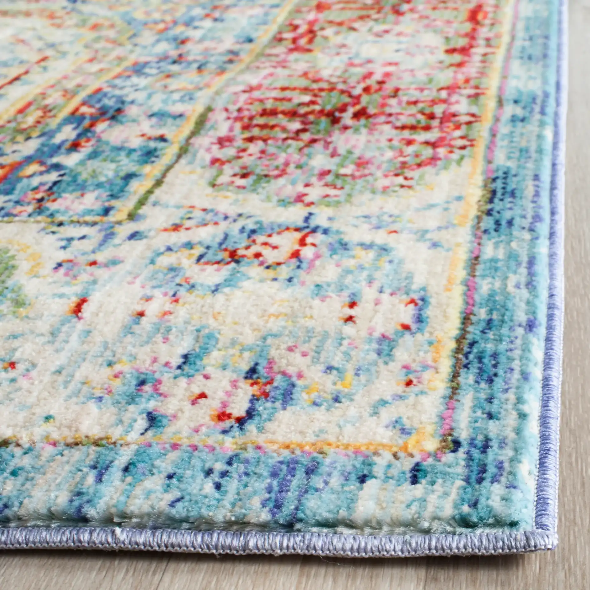 Valencia Medallion Rug in Blue / Multicolor in a styled room