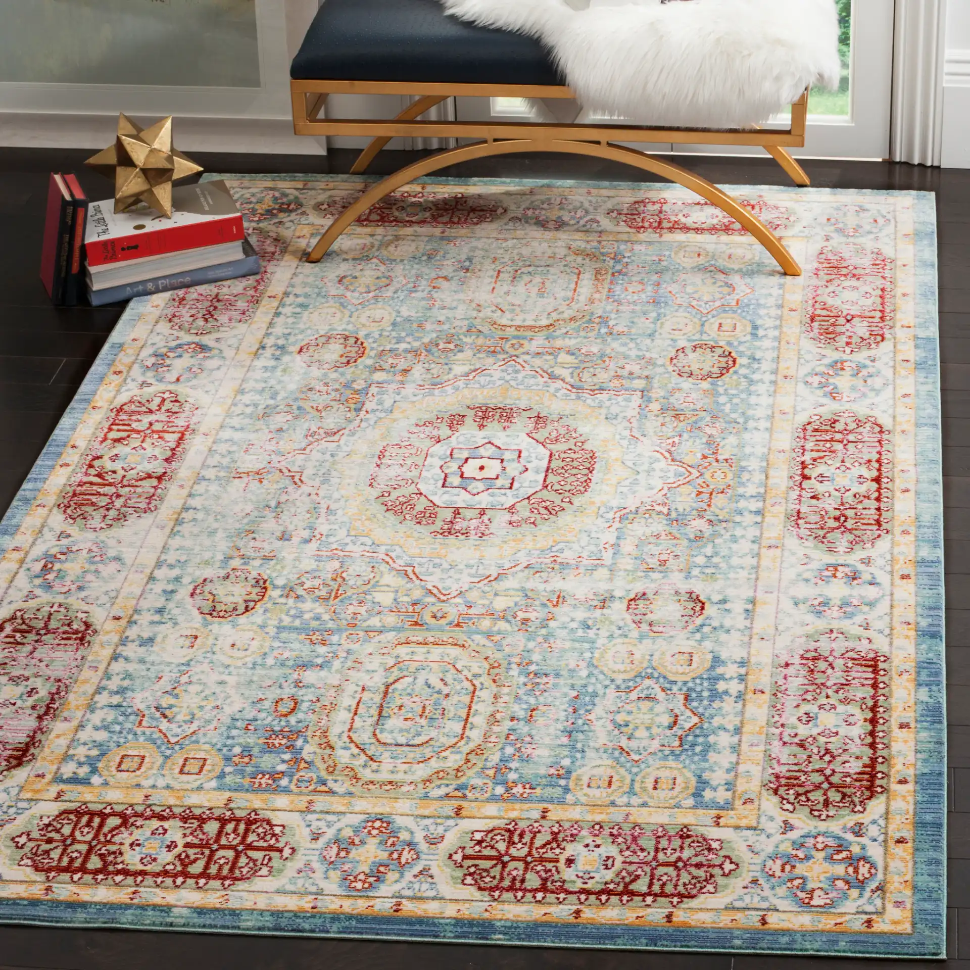 Valencia Medallion Rug in Blue / Multicolor in a styled room