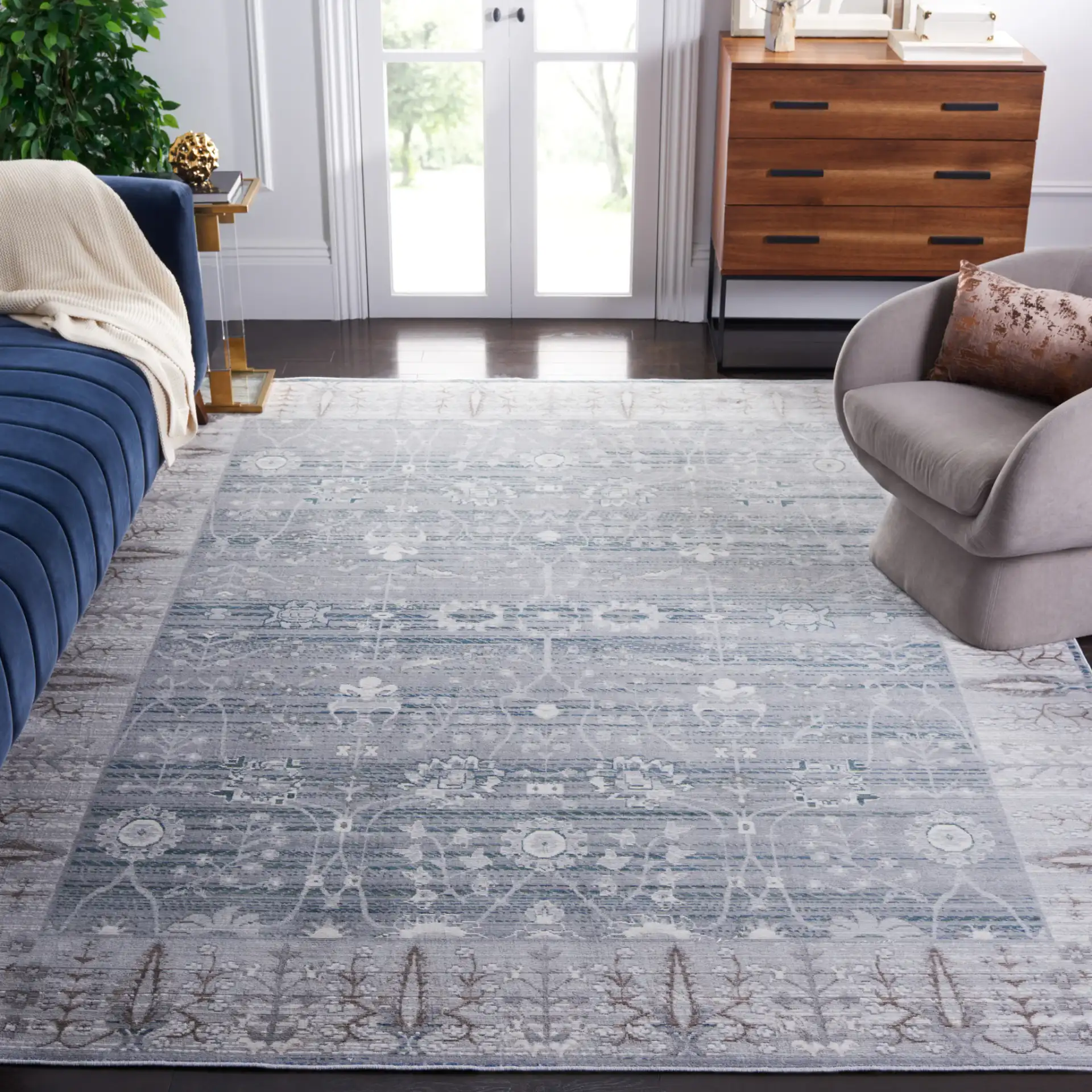 Valencia Botanical Bordered Rug in Gray / Green in a styled room