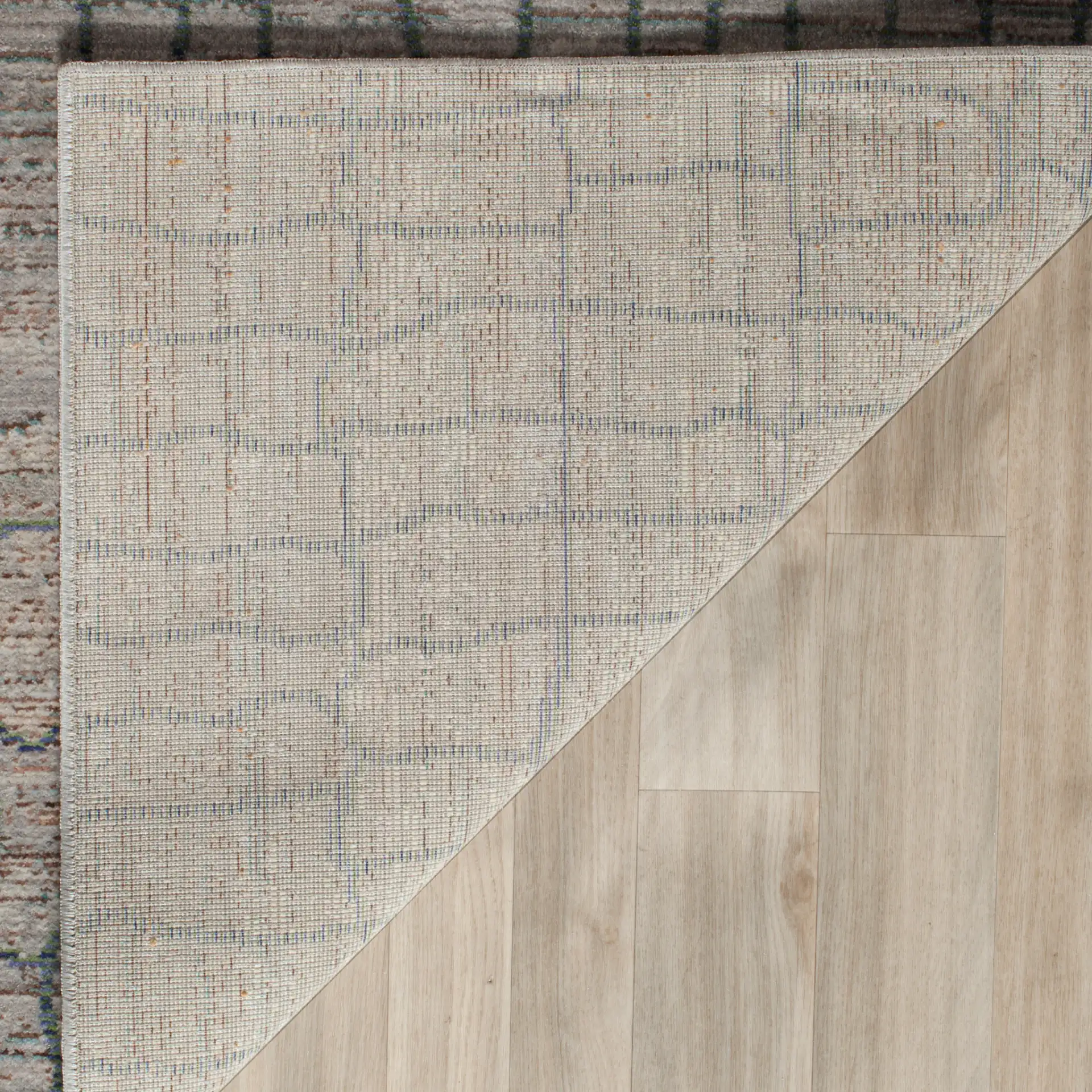 Valencia Abstract Grid Rug in Gray / Multicolor in a styled room