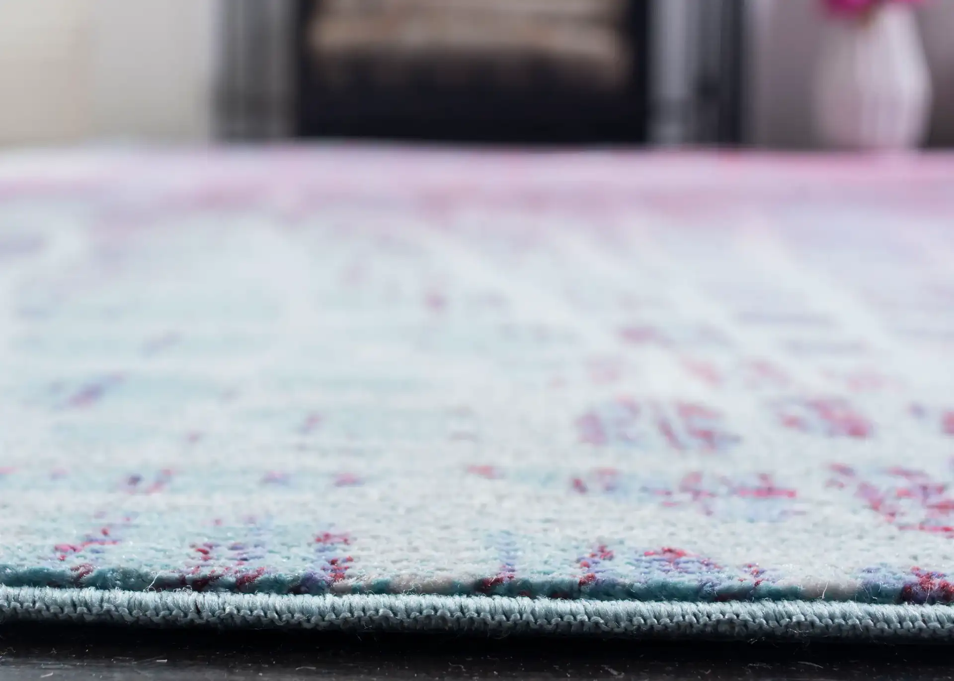 Valencia Cellular Abstract Rug in Blue / Fuchsia in a styled room
