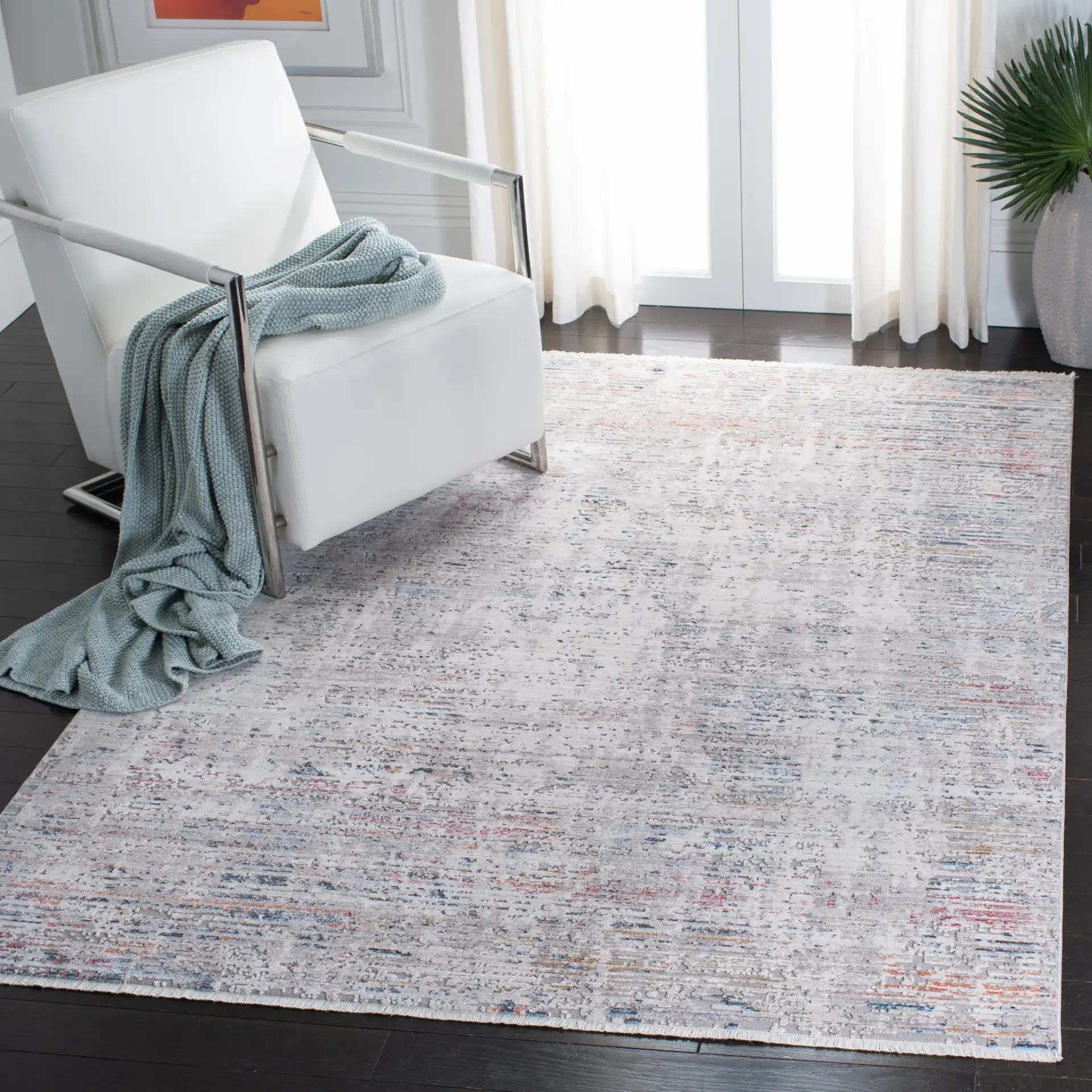 Valencia Abstract Linear Rug in Gray / Blue in a styled room