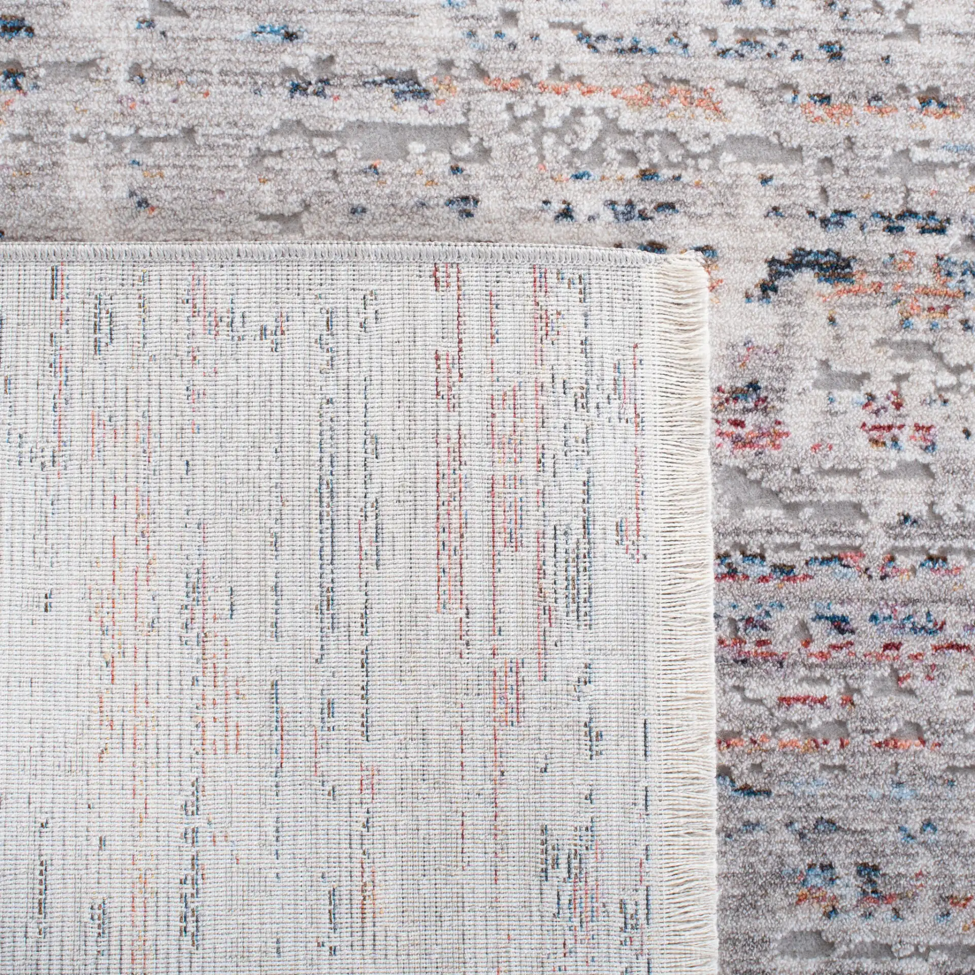 Valencia Abstract Linear Rug in Gray / Blue in a styled room