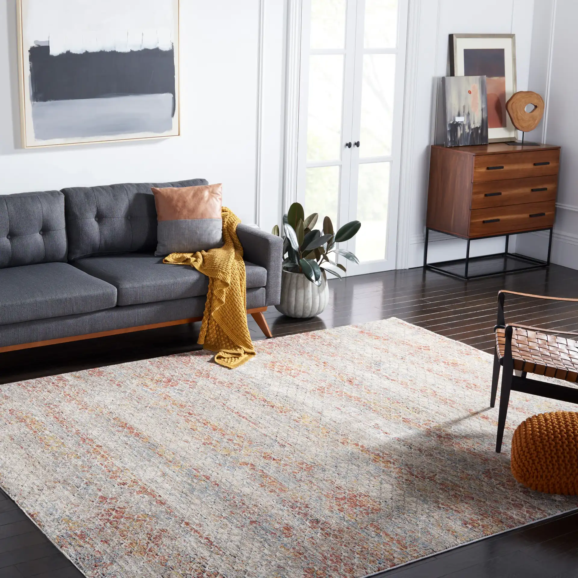 Valencia Distressed Trellis Rug in Beige / Rust in a styled room