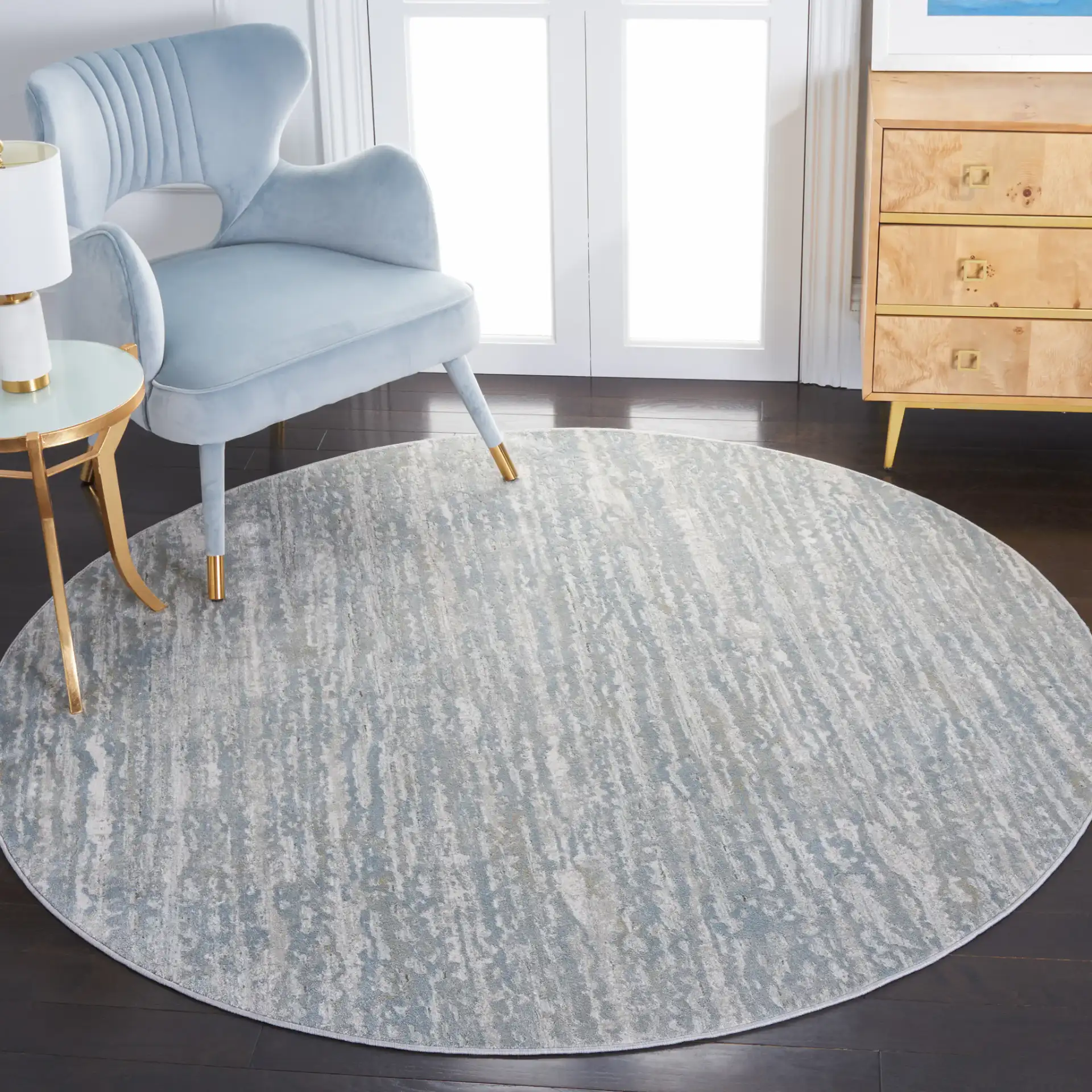 Valencia Allover Abstract Rug in Light Gray / Blue in a styled room