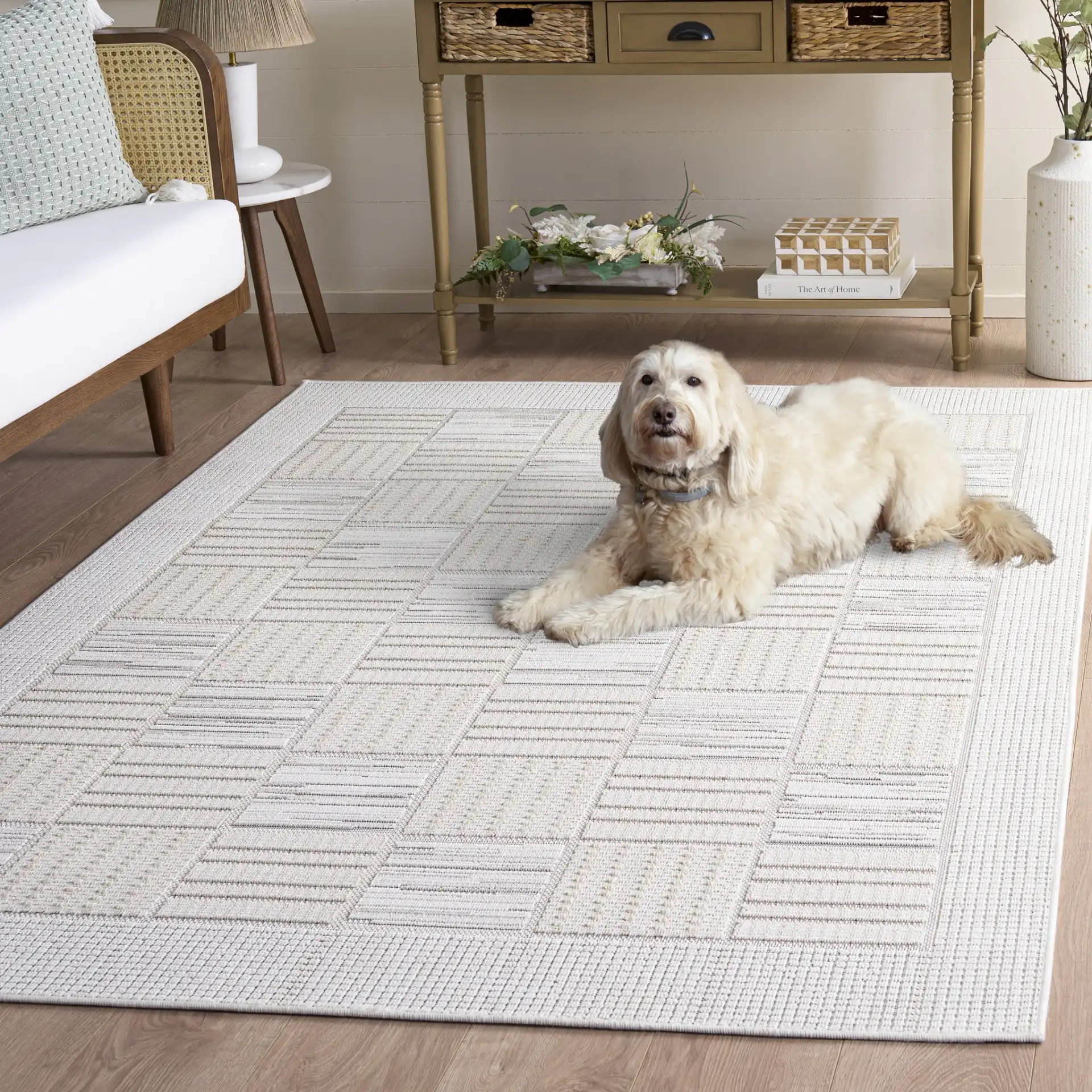 Veranda Checkered Grid Rug in Ivory / Beige in a styled room